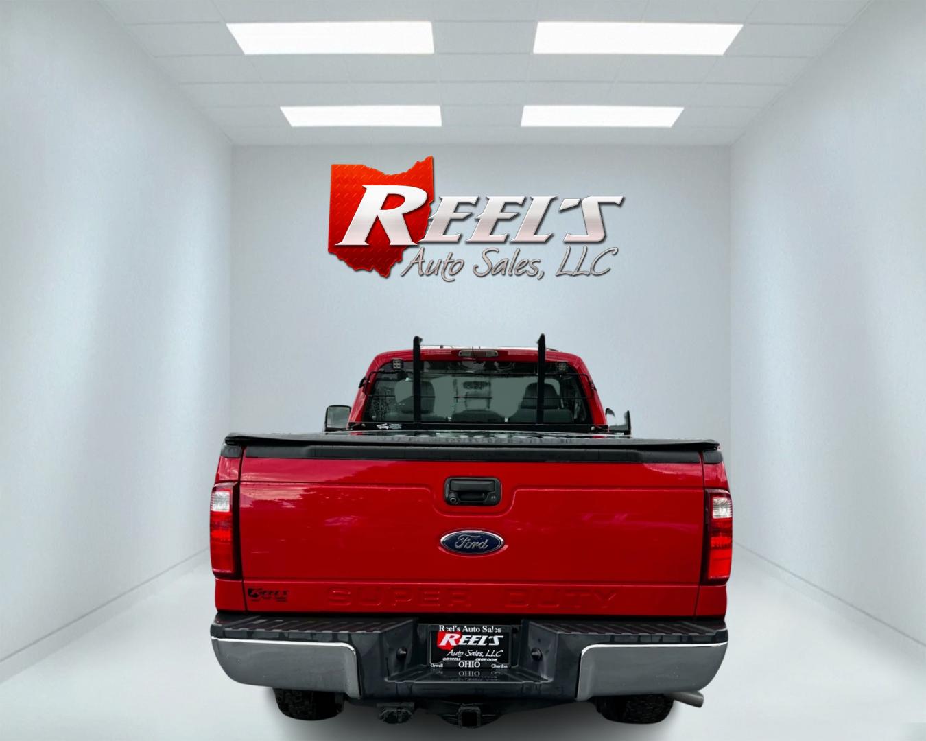 2015 Red /Gray Ford F-350 SD XL 4WD (1FTRF3BT0FE) with an 6.7L V8 OHV 16V DIESEL engine, 6-Speed Automatic transmission, located at 11115 Chardon Rd. , Chardon, OH, 44024, (440) 214-9705, 41.580246, -81.241943 - This 2015 Ford F-350 XL Reg Cab is a heavy-duty pickup truck that features a 6.7L Power Stroke V8 Bio Diesel capable engine, producing 440 horsepower and 860 lb-ft of torque. The truck has a 3.55 gearing system and is equipped with a locking rear differential for added traction. The exterior feature - Photo#6