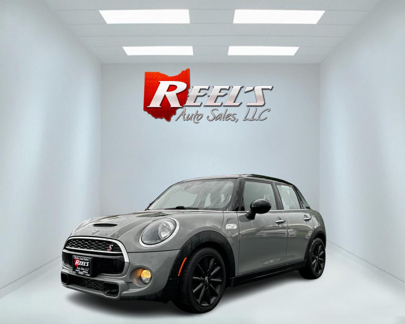 2019 Gray /Black Mini Cooper S 4-Door (WMWXU3C59K2) with an 2.0L I4 DOHC 16V TURBO engine, 6 Speed Manual transmission, located at 547 E. Main St., Orwell, OH, 44076, (440) 437-5893, 41.535435, -80.847855 - This 2019 Mini Cooper S 4-door is a premium hatchback that features a 2.0L I4 turbocharged engine paired with a 6-speed manual transmission, producing 189 horsepower and 207 lb-ft of torque. The vehicle can go from 0-60 in just 6.3 seconds, making it a fun and fuel-efficient car. The interior is wra - Photo#0