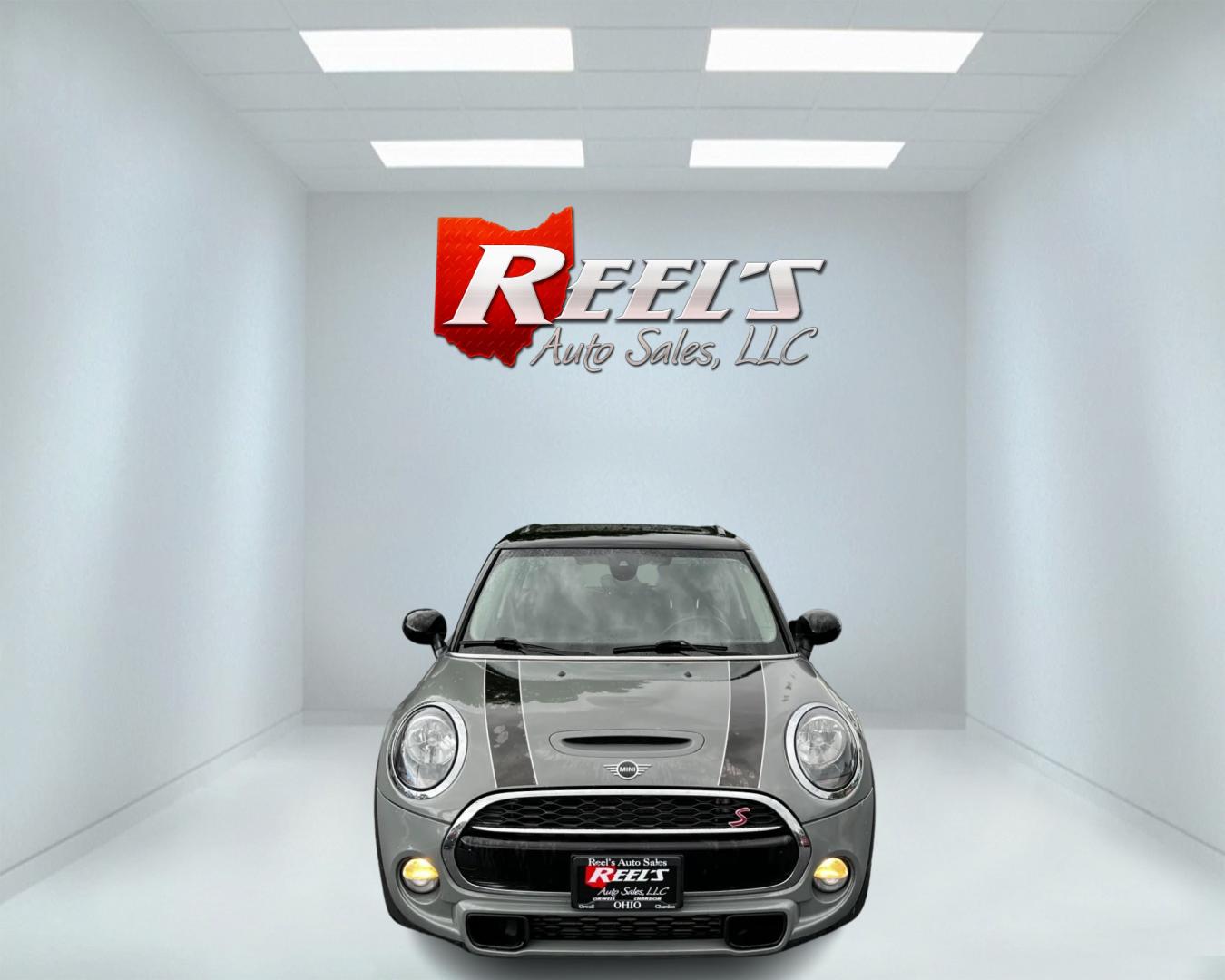 2019 Gray /Black Mini Cooper S 4-Door (WMWXU3C59K2) with an 2.0L I4 DOHC 16V TURBO engine, 6 Speed Manual transmission, located at 547 E. Main St., Orwell, OH, 44076, (440) 437-5893, 41.535435, -80.847855 - This 2019 Mini Cooper S 4-door is a premium hatchback that features a 2.0L I4 turbocharged engine paired with a 6-speed manual transmission, producing 189 horsepower and 207 lb-ft of torque. The vehicle can go from 0-60 in just 6.3 seconds, making it a fun and fuel-efficient car. The interior is wra - Photo#1