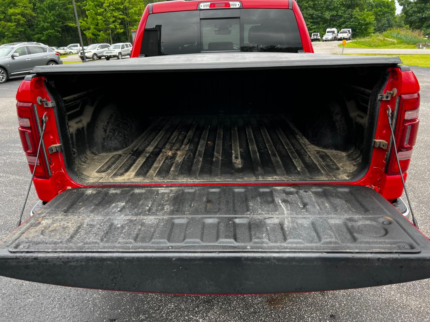 2020 Red /Black RAM 1500 Laramie Crew Cab SWB 4WD (1C6SRFJT0LN) with an 5.7L V8 OHV 16V engine, 8A transmission, located at 547 E. Main St., Orwell, OH, 44076, (440) 437-5893, 41.535435, -80.847855 - This 2020 Ram 1500 Laramie Crew Cab 4WD is equipped with a powerful 5.7 HEMI eTorque engine and an 8-speed automatic transmission, featuring 3.21 gearing and an impressive 8,120-pound towing capacity. Its exterior lighting is fully LED with auto high beams, ensuring excellent visibility. The truck i - Photo#11