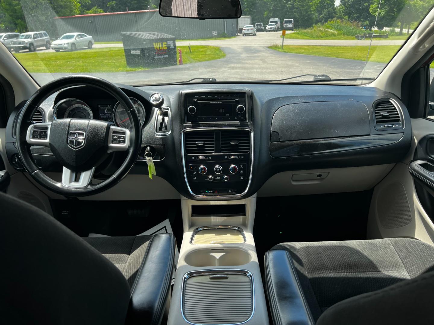 2015 Red /Black Dodge Grand Caravan SXT (2C4RDGCG8FR) with an 3.6L V6 DOHC 24V FFV engine, 6-Speed Automatic transmission, located at 11115 Chardon Rd. , Chardon, OH, 44024, (440) 214-9705, 41.580246, -81.241943 - This 2015 Dodge Grand Caravan SXT is powered by a 3.6 Pentastar V6 engine paired with a 6-speed automatic transmission and is flex-fuel capable. This minivan offers exceptional versatility with its Stow 'N Go seating, allowing for ample storage and seating arrangement flexibility. Tri-zone manual cl - Photo#33