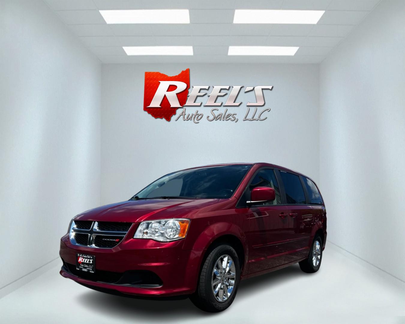 2015 Red /Black Dodge Grand Caravan SXT (2C4RDGCG8FR) with an 3.6L V6 DOHC 24V FFV engine, 6-Speed Automatic transmission, located at 11115 Chardon Rd. , Chardon, OH, 44024, (440) 214-9705, 41.580246, -81.241943 - This 2015 Dodge Grand Caravan SXT is powered by a 3.6 Pentastar V6 engine paired with a 6-speed automatic transmission and is flex-fuel capable. This minivan offers exceptional versatility with its Stow 'N Go seating, allowing for ample storage and seating arrangement flexibility. Tri-zone manual cl - Photo#0