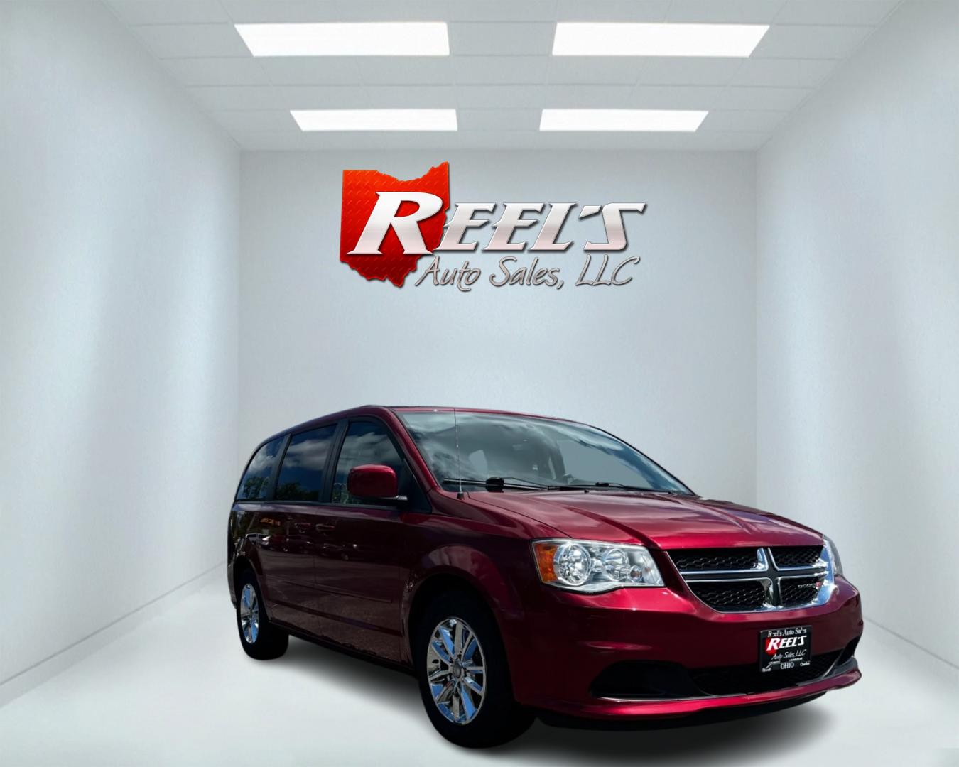 2015 Red /Black Dodge Grand Caravan SXT (2C4RDGCG8FR) with an 3.6L V6 DOHC 24V FFV engine, 6-Speed Automatic transmission, located at 11115 Chardon Rd. , Chardon, OH, 44024, (440) 214-9705, 41.580246, -81.241943 - This 2015 Dodge Grand Caravan SXT is powered by a 3.6 Pentastar V6 engine paired with a 6-speed automatic transmission and is flex-fuel capable. This minivan offers exceptional versatility with its Stow 'N Go seating, allowing for ample storage and seating arrangement flexibility. Tri-zone manual cl - Photo#2