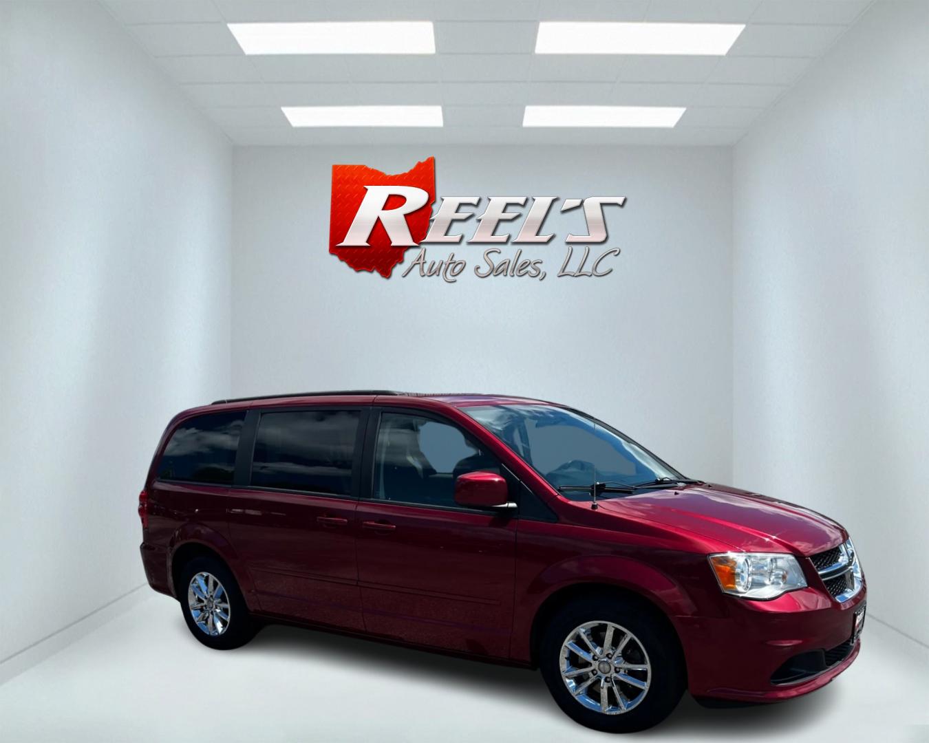 2015 Red /Black Dodge Grand Caravan SXT (2C4RDGCG8FR) with an 3.6L V6 DOHC 24V FFV engine, 6-Speed Automatic transmission, located at 11115 Chardon Rd. , Chardon, OH, 44024, (440) 214-9705, 41.580246, -81.241943 - This 2015 Dodge Grand Caravan SXT is powered by a 3.6 Pentastar V6 engine paired with a 6-speed automatic transmission and is flex-fuel capable. This minivan offers exceptional versatility with its Stow 'N Go seating, allowing for ample storage and seating arrangement flexibility. Tri-zone manual cl - Photo#3