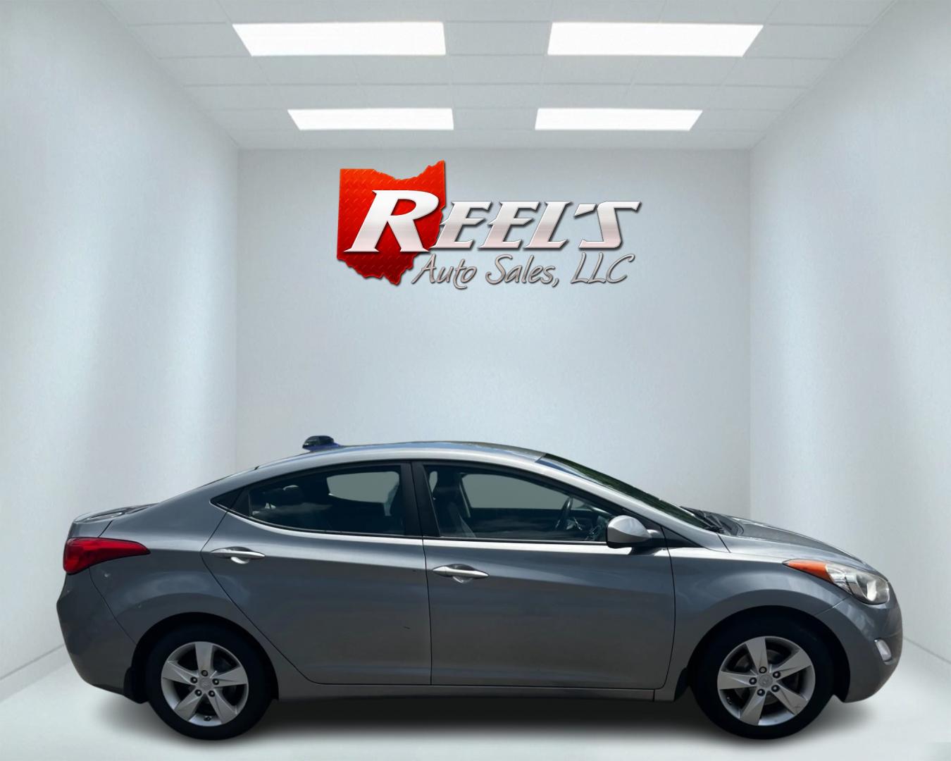 2013 Silver /Gray Hyundai Elantra GLS A/T (KMHDH4AE6DU) with an 1.8L I4 DOHC 16V engine, 6-Speed Automatic transmission, located at 11115 Chardon Rd. , Chardon, OH, 44024, (440) 214-9705, 41.580246, -81.241943 - This 2013 Hyundai Elantra GLS is an economical and reliable compact sedan powered by a 1.8 I4 engine and a 6-speed automatic transmission, achieving an impressive 38 MPG on the highway. It offers a comfortable and convenient driving experience with features like heated seats, a USB audio input for e - Photo#4