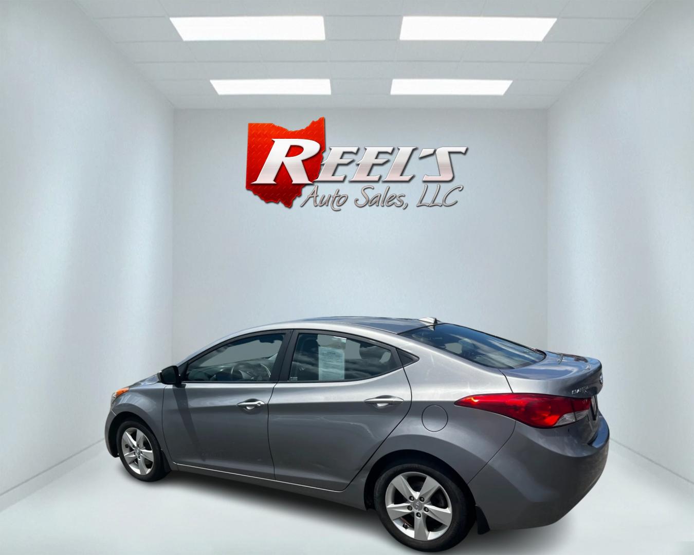 2013 Silver /Gray Hyundai Elantra GLS A/T (KMHDH4AE6DU) with an 1.8L I4 DOHC 16V engine, 6-Speed Automatic transmission, located at 11115 Chardon Rd. , Chardon, OH, 44024, (440) 214-9705, 41.580246, -81.241943 - This 2013 Hyundai Elantra GLS is an economical and reliable compact sedan powered by a 1.8 I4 engine and a 6-speed automatic transmission, achieving an impressive 38 MPG on the highway. It offers a comfortable and convenient driving experience with features like heated seats, a USB audio input for e - Photo#8