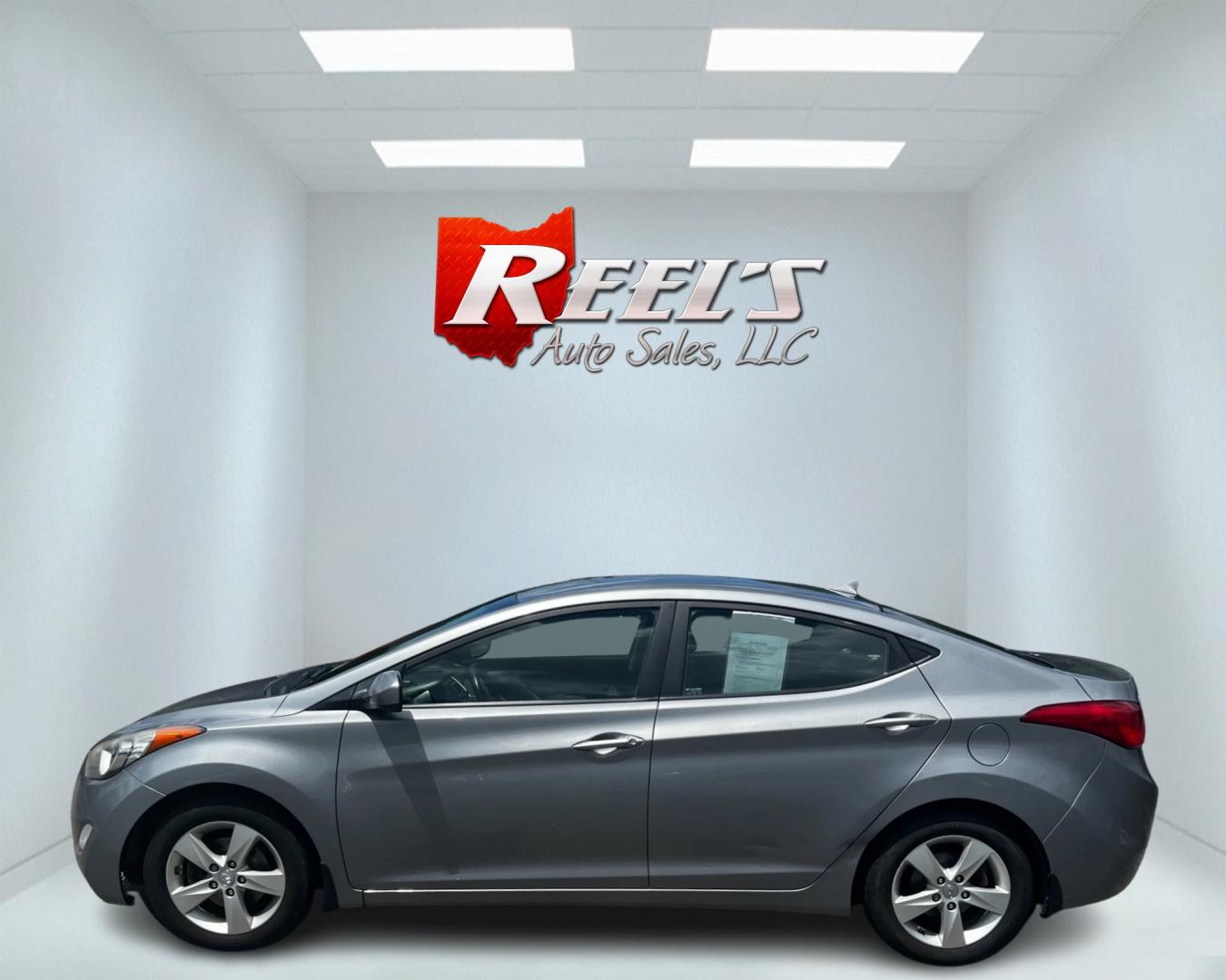 2013 Silver /Gray Hyundai Elantra GLS A/T (KMHDH4AE6DU) with an 1.8L I4 DOHC 16V engine, 6-Speed Automatic transmission, located at 11115 Chardon Rd. , Chardon, OH, 44024, (440) 214-9705, 41.580246, -81.241943 - This 2013 Hyundai Elantra GLS is an economical and reliable compact sedan powered by a 1.8 I4 engine and a 6-speed automatic transmission, achieving an impressive 38 MPG on the highway. It offers a comfortable and convenient driving experience with features like heated seats, a USB audio input for e - Photo#9