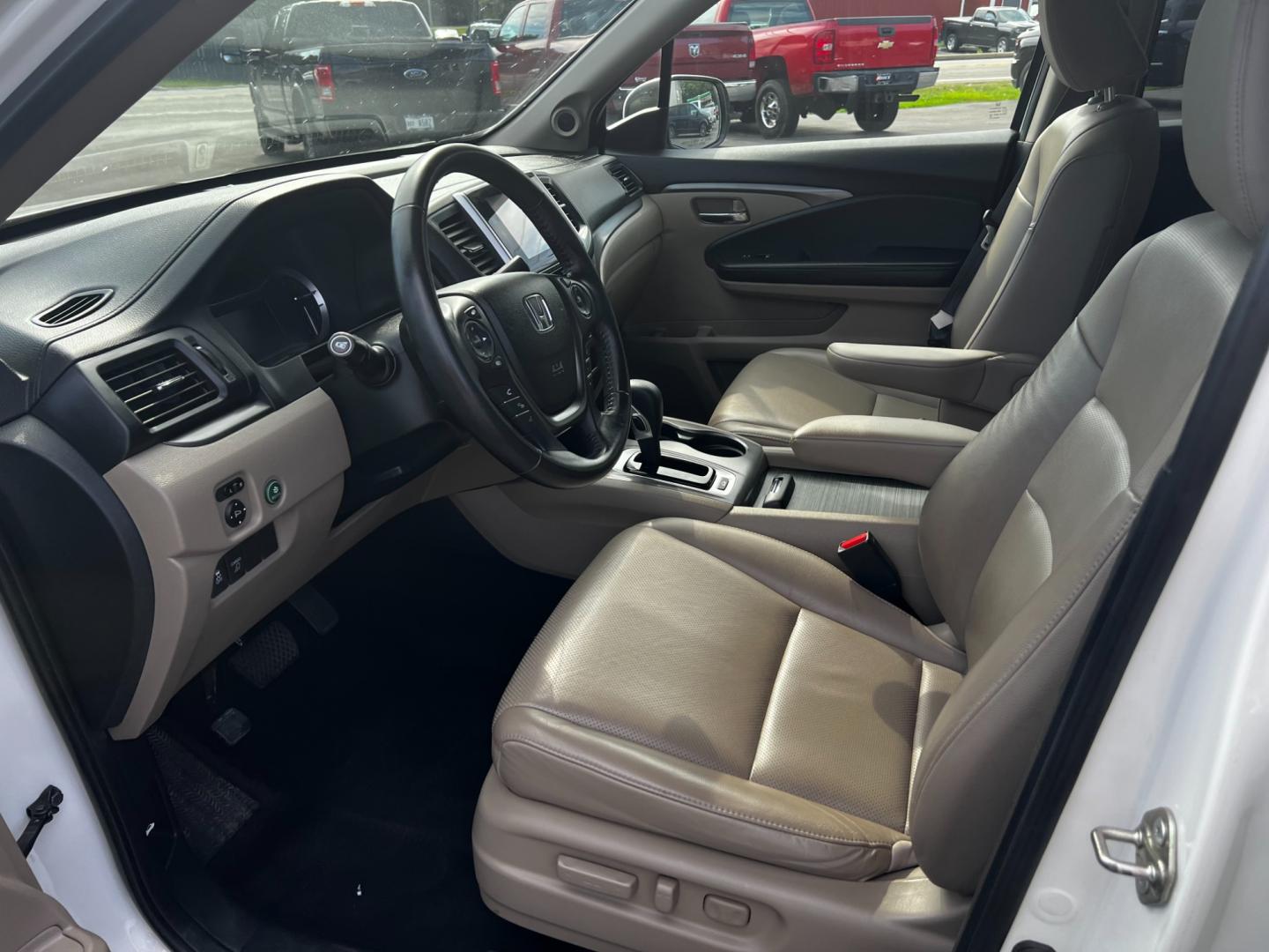 2017 White /Tan Honda Ridgeline RTL-T AWD (5FPYK3F61HB) with an 3.5L V6 SOHC 24V engine, 6-Speed Automatic transmission, located at 11115 Chardon Rd. , Chardon, OH, 44024, (440) 214-9705, 41.580246, -81.241943 - This 2017 Honda Pilot Ridgeline RTL-T AWD is powered by a 3.5 SOHC VTEC V6 engine paired with a 6-speed automatic transmission and offers selectable drive modes. It features LED daytime running lights, tri-zone automatic climate control, and a towing capacity of 5,000 pounds. Safety and convenience - Photo#21