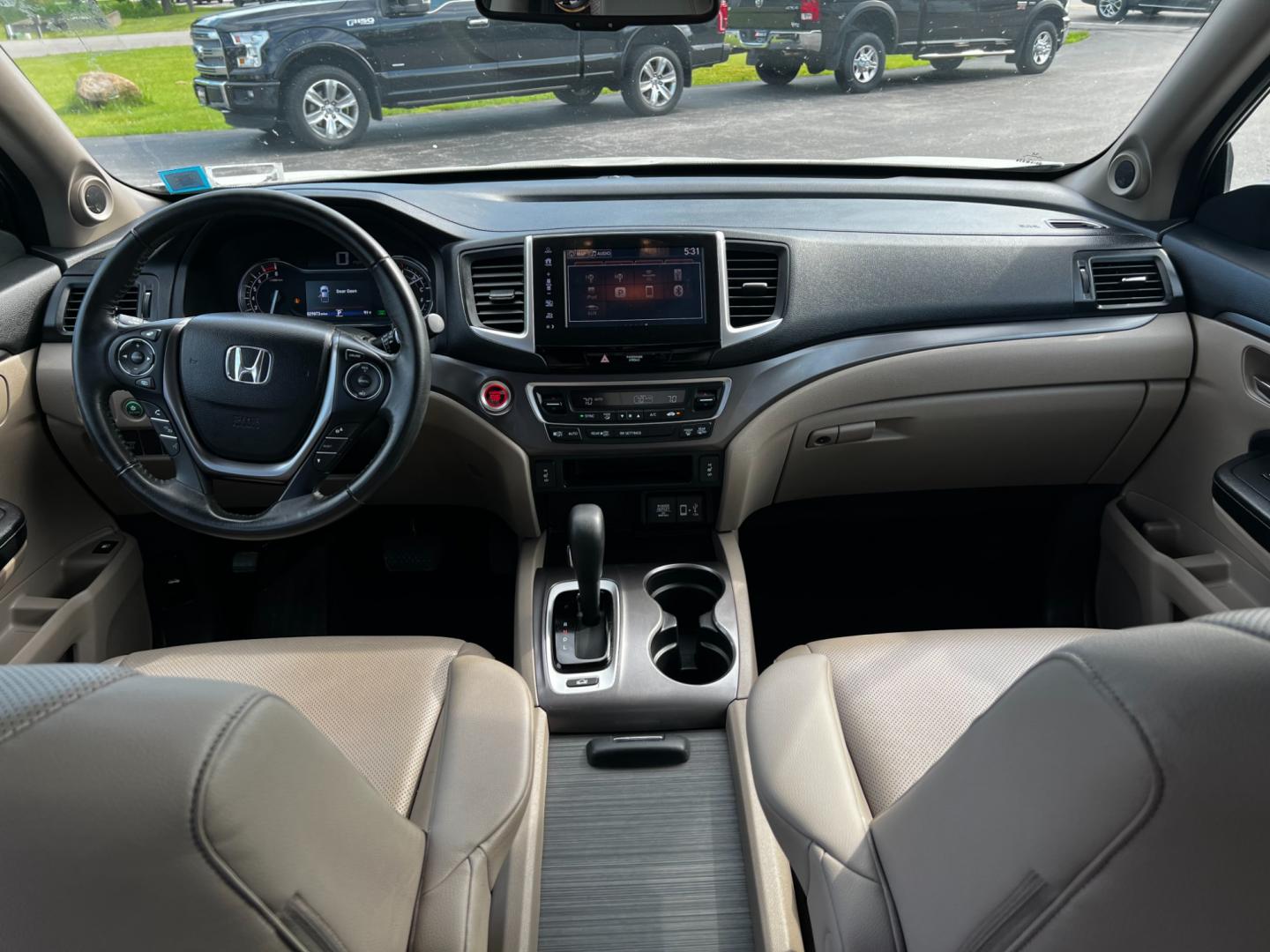 2017 White /Tan Honda Ridgeline RTL-T AWD (5FPYK3F61HB) with an 3.5L V6 SOHC 24V engine, 6-Speed Automatic transmission, located at 11115 Chardon Rd. , Chardon, OH, 44024, (440) 214-9705, 41.580246, -81.241943 - This 2017 Honda Pilot Ridgeline RTL-T AWD is powered by a 3.5 SOHC VTEC V6 engine paired with a 6-speed automatic transmission and offers selectable drive modes. It features LED daytime running lights, tri-zone automatic climate control, and a towing capacity of 5,000 pounds. Safety and convenience - Photo#45