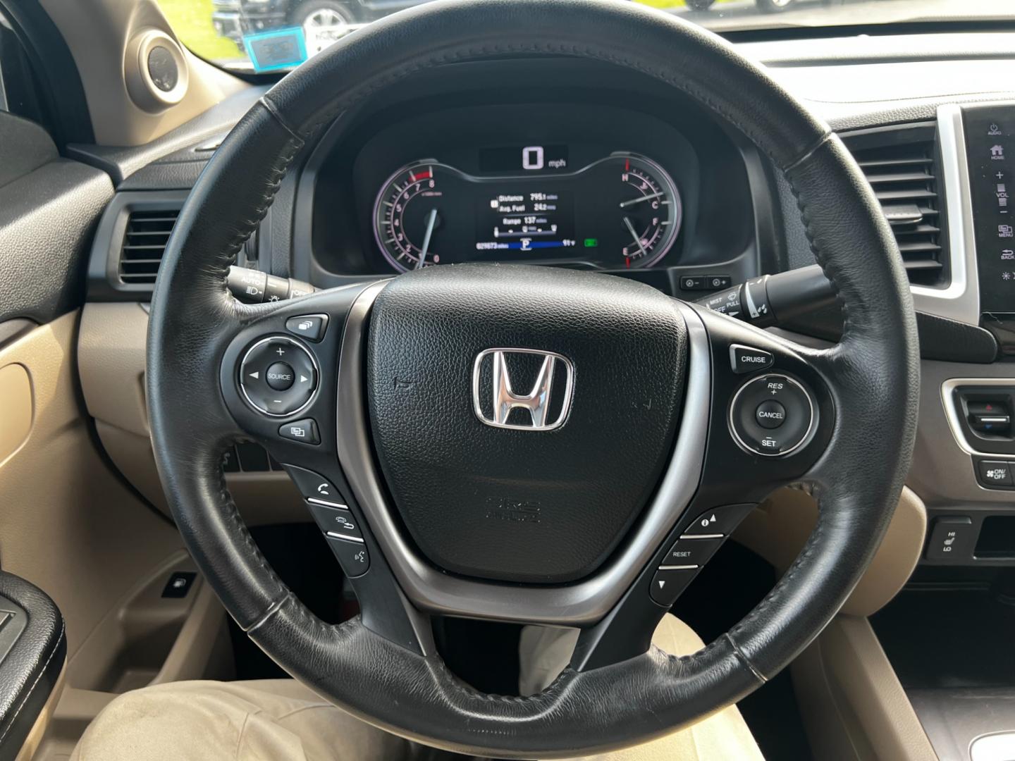 2017 White /Tan Honda Ridgeline RTL-T AWD (5FPYK3F61HB) with an 3.5L V6 SOHC 24V engine, 6-Speed Automatic transmission, located at 11115 Chardon Rd. , Chardon, OH, 44024, (440) 214-9705, 41.580246, -81.241943 - This 2017 Honda Pilot Ridgeline RTL-T AWD is powered by a 3.5 SOHC VTEC V6 engine paired with a 6-speed automatic transmission and offers selectable drive modes. It features LED daytime running lights, tri-zone automatic climate control, and a towing capacity of 5,000 pounds. Safety and convenience - Photo#32