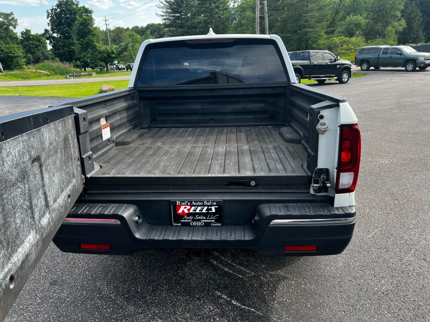 2017 White /Tan Honda Ridgeline RTL-T AWD (5FPYK3F61HB) with an 3.5L V6 SOHC 24V engine, 6-Speed Automatic transmission, located at 11115 Chardon Rd. , Chardon, OH, 44024, (440) 214-9705, 41.580246, -81.241943 - This 2017 Honda Pilot Ridgeline RTL-T AWD is powered by a 3.5 SOHC VTEC V6 engine paired with a 6-speed automatic transmission and offers selectable drive modes. It features LED daytime running lights, tri-zone automatic climate control, and a towing capacity of 5,000 pounds. Safety and convenience - Photo#14