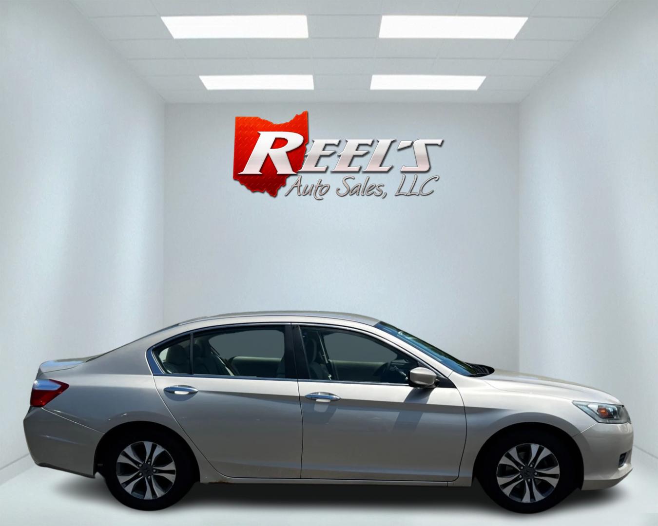 2013 Gold /Tan Honda Accord LX Sedan CVT (1HGCR2F33DA) with an 2.4L I4 DOHC 16V engine, Continuously Variable Transmission transmission, located at 11115 Chardon Rd. , Chardon, OH, 44024, (440) 214-9705, 41.580246, -81.241943 - This 2013 Honda Accord LX is a reliable midsize sedan equipped with a 2.4-liter Earthdreams I4 engine and a CVT transmission, achieving 35 MPG on the highway and currently having 65K miles. Key features include daytime running lights, dusk-sensing headlights, a backup camera, and dual-zone automatic - Photo#4