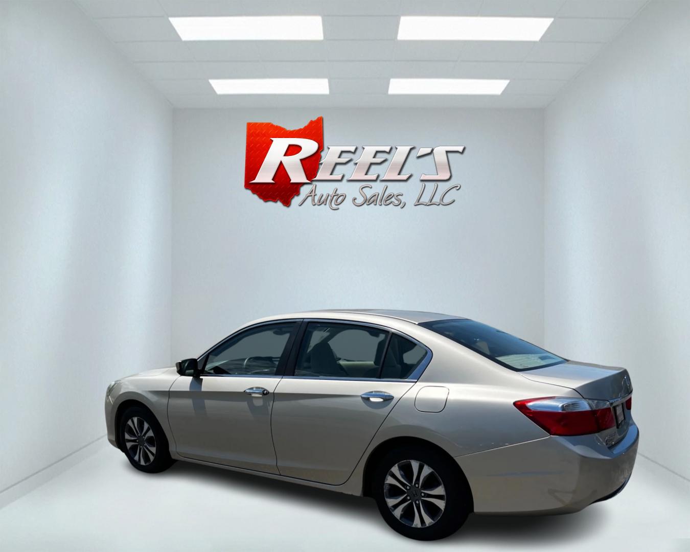 2013 Gold /Tan Honda Accord LX Sedan CVT (1HGCR2F33DA) with an 2.4L I4 DOHC 16V engine, Continuously Variable Transmission transmission, located at 11115 Chardon Rd. , Chardon, OH, 44024, (440) 214-9705, 41.580246, -81.241943 - This 2013 Honda Accord LX is a reliable midsize sedan equipped with a 2.4-liter Earthdreams I4 engine and a CVT transmission, achieving 35 MPG on the highway and currently having 65K miles. Key features include daytime running lights, dusk-sensing headlights, a backup camera, and dual-zone automatic - Photo#8