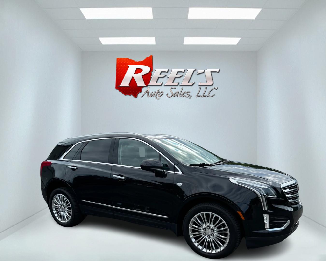 2017 Black /Black Cadillac XT5 Premium Luxury AWD (1GYKNERS8HZ) with an 3.6L V6 DOHC 24V engine, 8A transmission, located at 11115 Chardon Rd. , Chardon, OH, 44024, (440) 214-9705, 41.580246, -81.241943 - This 2017 Cadillac XT5 Premium Luxury AWD is a high-end SUV powered by a 3.6-liter V6 engine with 310 horsepower, paired with an 8-speed automatic transmission. It boasts an array of luxury features including power front seats, leather interior, heated and cooled front seats, a 14-speaker BOSE sound - Photo#3