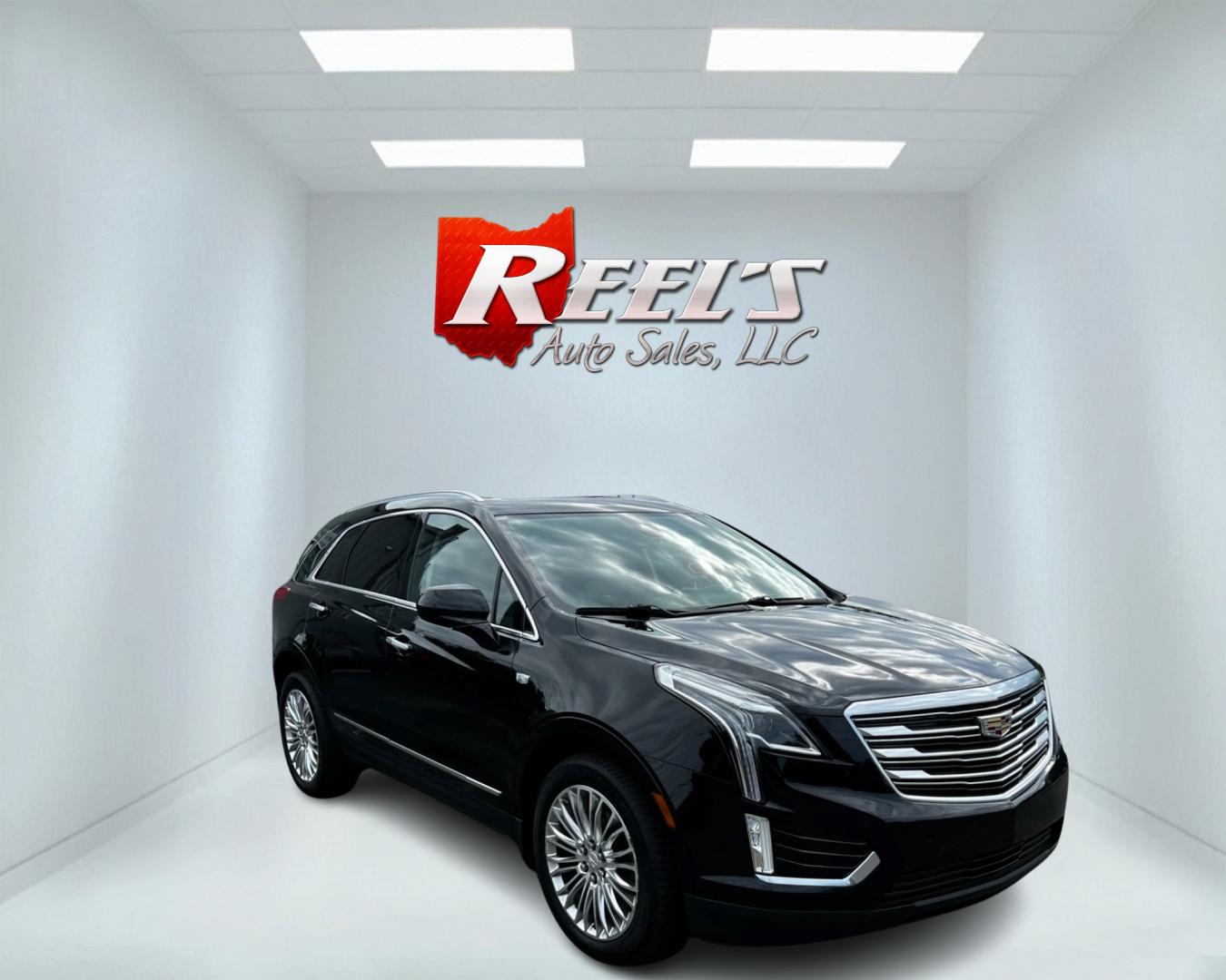 2017 Black /Black Cadillac XT5 Premium Luxury AWD (1GYKNERS8HZ) with an 3.6L V6 DOHC 24V engine, 8A transmission, located at 11115 Chardon Rd. , Chardon, OH, 44024, (440) 214-9705, 41.580246, -81.241943 - This 2017 Cadillac XT5 Premium Luxury AWD is a high-end SUV powered by a 3.6-liter V6 engine with 310 horsepower, paired with an 8-speed automatic transmission. It boasts an array of luxury features including power front seats, leather interior, heated and cooled front seats, a 14-speaker BOSE sound - Photo#2