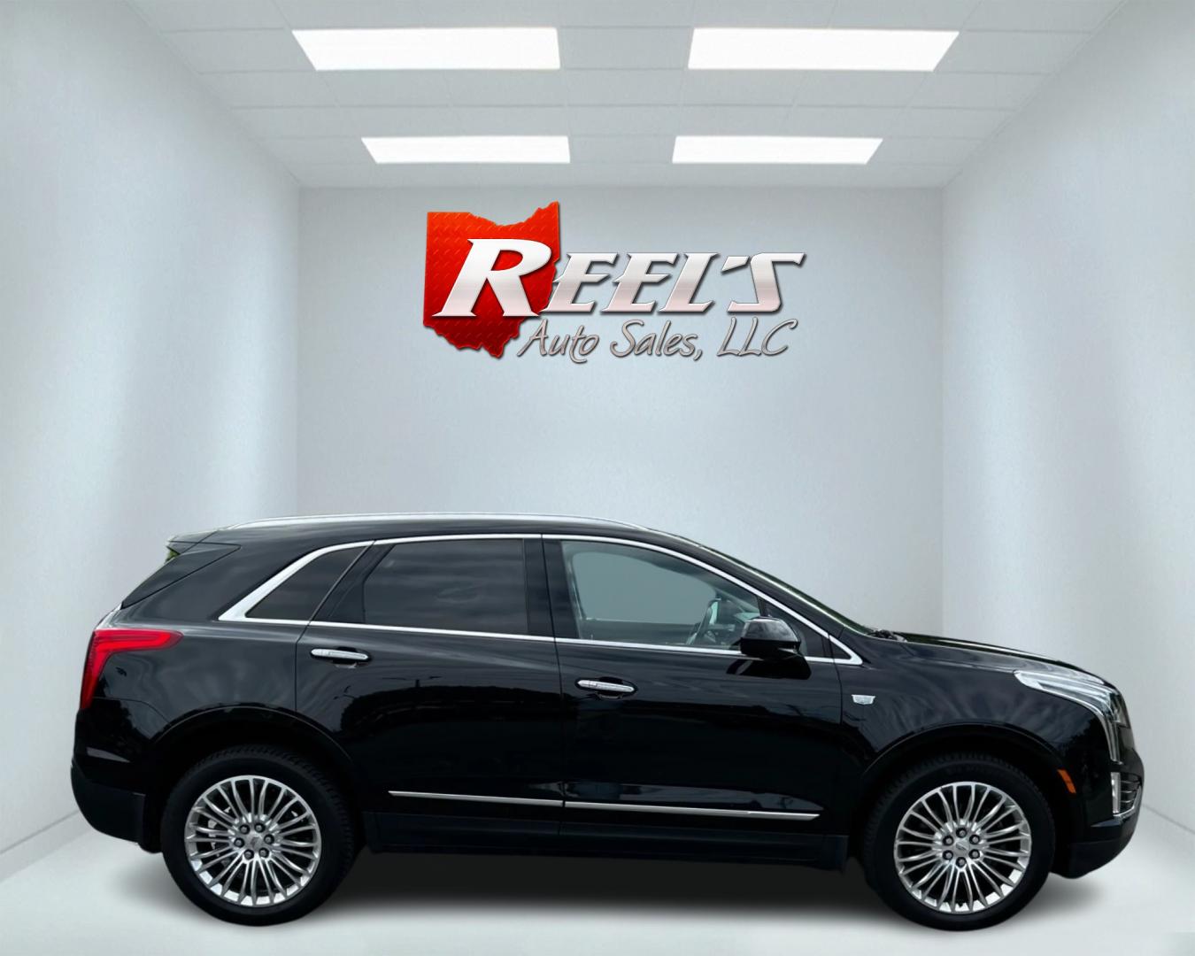 2017 Black /Black Cadillac XT5 Premium Luxury AWD (1GYKNERS8HZ) with an 3.6L V6 DOHC 24V engine, 8A transmission, located at 11115 Chardon Rd. , Chardon, OH, 44024, (440) 214-9705, 41.580246, -81.241943 - This 2017 Cadillac XT5 Premium Luxury AWD is a high-end SUV powered by a 3.6-liter V6 engine with 310 horsepower, paired with an 8-speed automatic transmission. It boasts an array of luxury features including power front seats, leather interior, heated and cooled front seats, a 14-speaker BOSE sound - Photo#4