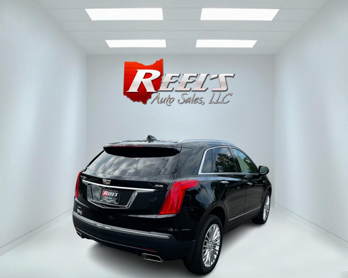 2017 Black /Black Cadillac XT5 Premium Luxury AWD (1GYKNERS8HZ) with an 3.6L V6 DOHC 24V engine, 8A transmission, located at 11115 Chardon Rd. , Chardon, OH, 44024, (440) 214-9705, 41.580246, -81.241943 - This 2017 Cadillac XT5 Premium Luxury AWD is a high-end SUV powered by a 3.6-liter V6 engine with 310 horsepower, paired with an 8-speed automatic transmission. It boasts an array of luxury features including power front seats, leather interior, heated and cooled front seats, a 14-speaker BOSE sound - Photo#5