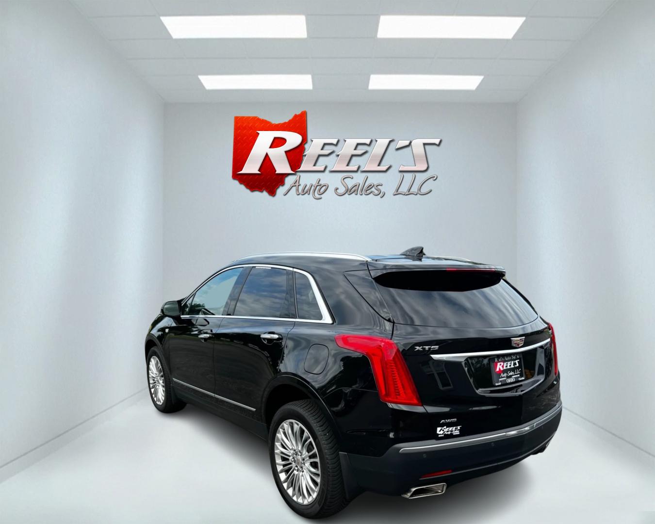 2017 Black /Black Cadillac XT5 Premium Luxury AWD (1GYKNERS8HZ) with an 3.6L V6 DOHC 24V engine, 8A transmission, located at 11115 Chardon Rd. , Chardon, OH, 44024, (440) 214-9705, 41.580246, -81.241943 - This 2017 Cadillac XT5 Premium Luxury AWD is a high-end SUV powered by a 3.6-liter V6 engine with 310 horsepower, paired with an 8-speed automatic transmission. It boasts an array of luxury features including power front seats, leather interior, heated and cooled front seats, a 14-speaker BOSE sound - Photo#7