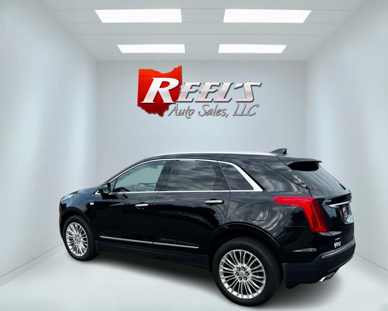 2017 Black /Black Cadillac XT5 Premium Luxury AWD (1GYKNERS8HZ) with an 3.6L V6 DOHC 24V engine, 8A transmission, located at 11115 Chardon Rd. , Chardon, OH, 44024, (440) 214-9705, 41.580246, -81.241943 - This 2017 Cadillac XT5 Premium Luxury AWD is a high-end SUV powered by a 3.6-liter V6 engine with 310 horsepower, paired with an 8-speed automatic transmission. It boasts an array of luxury features including power front seats, leather interior, heated and cooled front seats, a 14-speaker BOSE sound - Photo#8