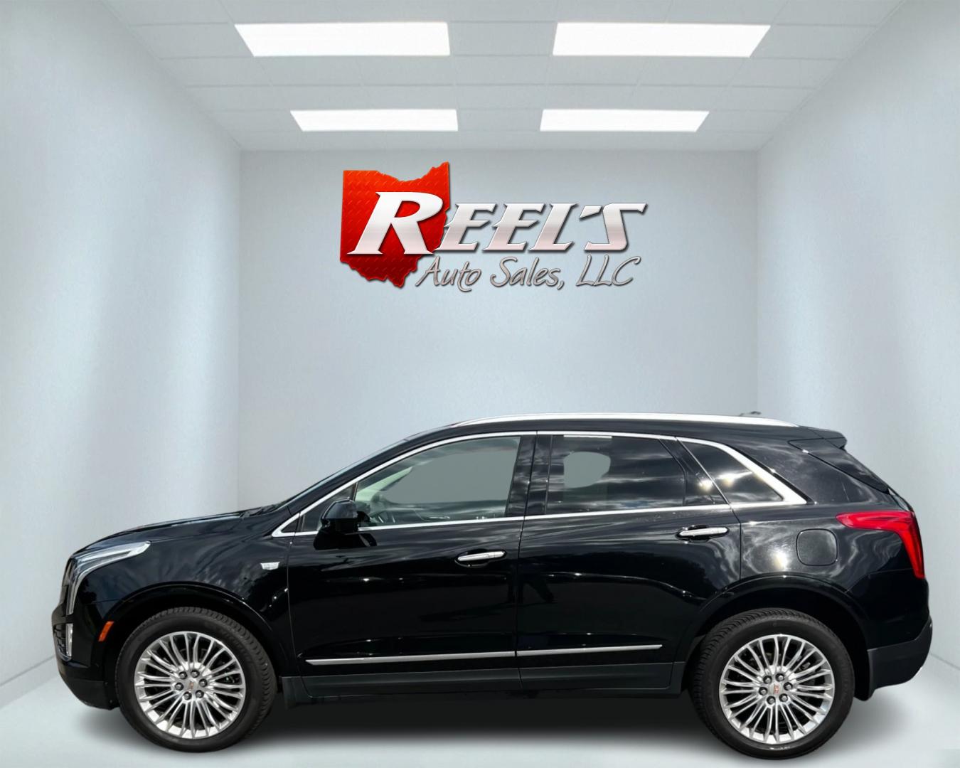 2017 Black /Black Cadillac XT5 Premium Luxury AWD (1GYKNERS8HZ) with an 3.6L V6 DOHC 24V engine, 8A transmission, located at 11115 Chardon Rd. , Chardon, OH, 44024, (440) 214-9705, 41.580246, -81.241943 - This 2017 Cadillac XT5 Premium Luxury AWD is a high-end SUV powered by a 3.6-liter V6 engine with 310 horsepower, paired with an 8-speed automatic transmission. It boasts an array of luxury features including power front seats, leather interior, heated and cooled front seats, a 14-speaker BOSE sound - Photo#9