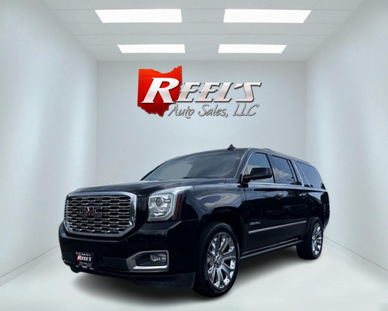 2018 Black /Black GMC Yukon XL Denali 4WD (1GKS2HKJ0JR) with an 6.2L V8 OHV 16V engine, 10 Speed Auto transmission, located at 11115 Chardon Rd. , Chardon, OH, 44024, (440) 214-9705, 41.580246, -81.241943 - This 2018 GMC Yukon XL Denali 4WD, powered by a robust 6.2 V8 engine with a 10-speed automatic transmission delivering 420 HP, is a powerful and luxurious full-size SUV. With a 7,900-pound towing capacity, it is well-suited for heavy-duty tasks. The HID headlights, LED daytime running lights, and ra - Photo#0