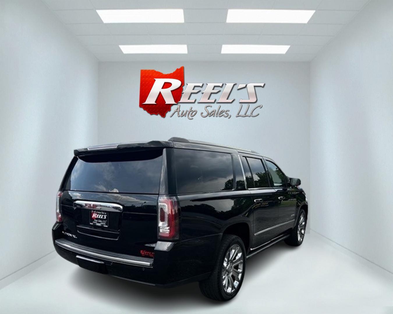 2018 Black /Black GMC Yukon XL Denali 4WD (1GKS2HKJ0JR) with an 6.2L V8 OHV 16V engine, 10 Speed Auto transmission, located at 11115 Chardon Rd. , Chardon, OH, 44024, (440) 214-9705, 41.580246, -81.241943 - This 2018 GMC Yukon XL Denali 4WD, powered by a robust 6.2 V8 engine with a 10-speed automatic transmission delivering 420 HP, is a powerful and luxurious full-size SUV. With a 7,900-pound towing capacity, it is well-suited for heavy-duty tasks. The HID headlights, LED daytime running lights, and ra - Photo#4