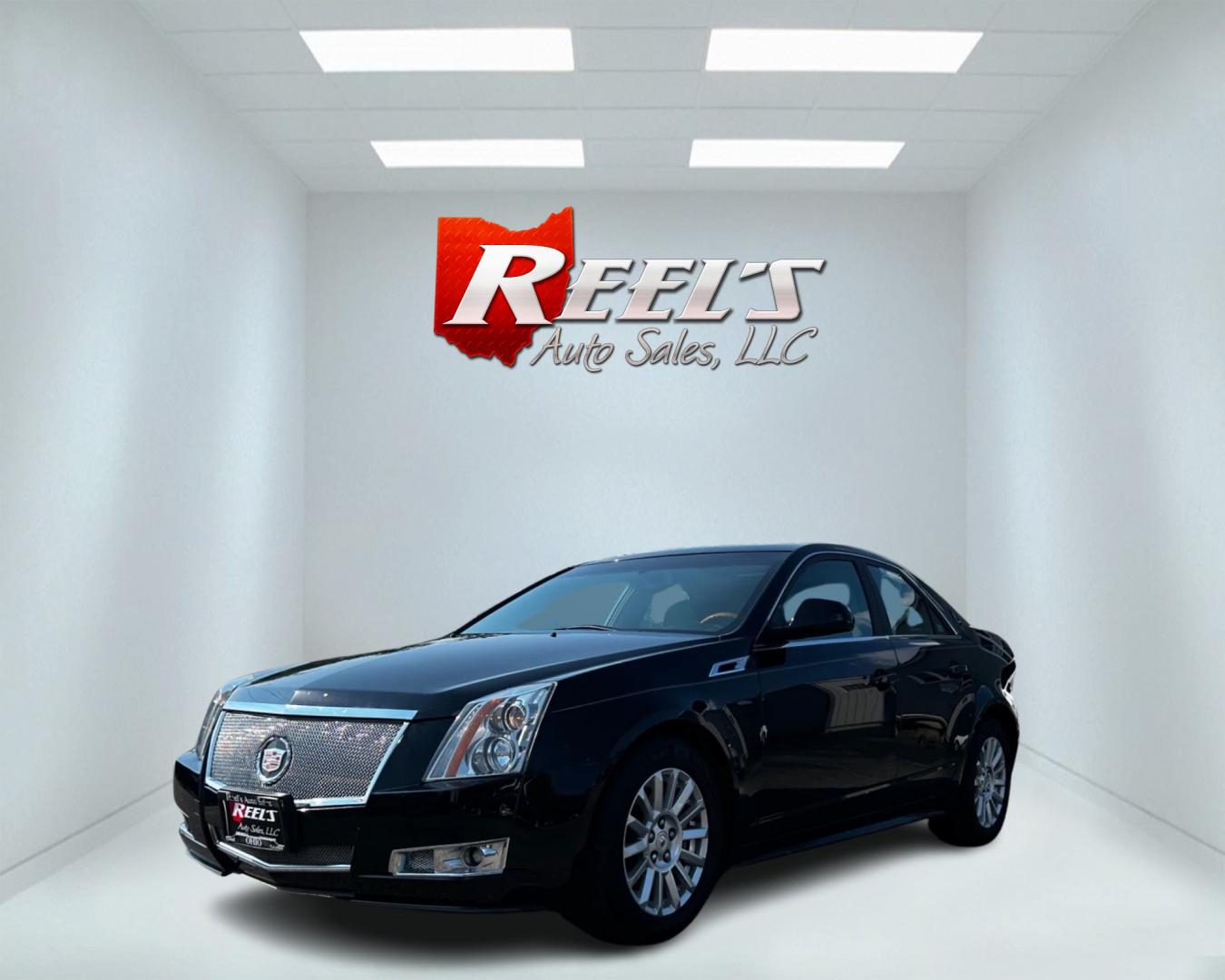 2011 Black /White Cadillac CTS 3.0L Luxury Collection (1G6DE5EYXB0) with an 3.0L V6 DOHC 24V engine, 6-Speed Automatic transmission, located at 11115 Chardon Rd. , Chardon, OH, 44024, (440) 214-9705, 41.580246, -81.241943 - This 2011 Cadillac CTS Luxury Collection is a sophisticated rear-wheel-drive sedan with a 6-speed automatic transmission and a robust 3.0L V6 engine producing 270 horsepower. It boasts a deluxe interior featuring leather seats, heated and power-adjustable front seats, and a premium Bose sound system - Photo#0