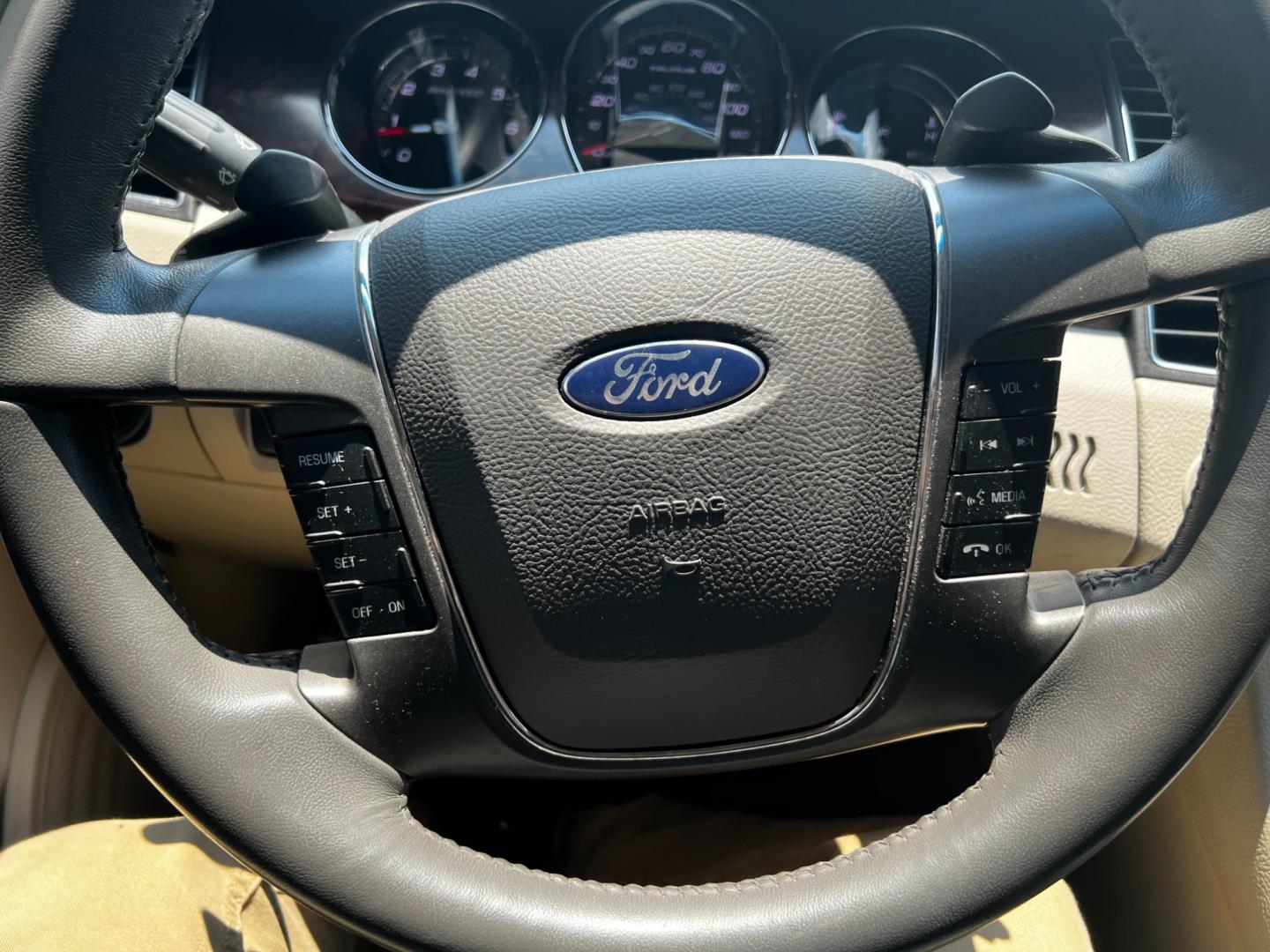 2011 White /Tan Ford Taurus SEL FWD (1FAHP2EWXBG) with an 3.5L V6 DOHC 24V engine, 6 Speed Automatic transmission, located at 11115 Chardon Rd. , Chardon, OH, 44024, (440) 214-9705, 41.580246, -81.241943 - This 2011 Ford Taurus SEL is a reliable and comfortable sedan powered by a 3.5L V6 engine delivering 263 HP, paired with a 6-speed automatic transmission. It offers a range of premium features including a power driver's seat, dual-zone automatic climate control, and backup sensors. For enhanced visi - Photo#23