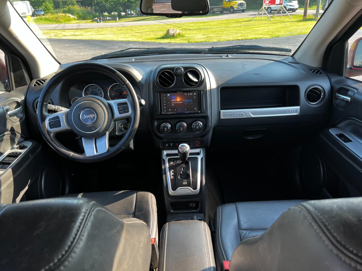 2017 Red /Black Jeep Compass High Altitude 4WD (1C4NJDEB0HD) with an 2.4L I4 DOHC 16V engine, 6A transmission, located at 11115 Chardon Rd. , Chardon, OH, 44024, (440) 214-9705, 41.580246, -81.241943 - Photo#34