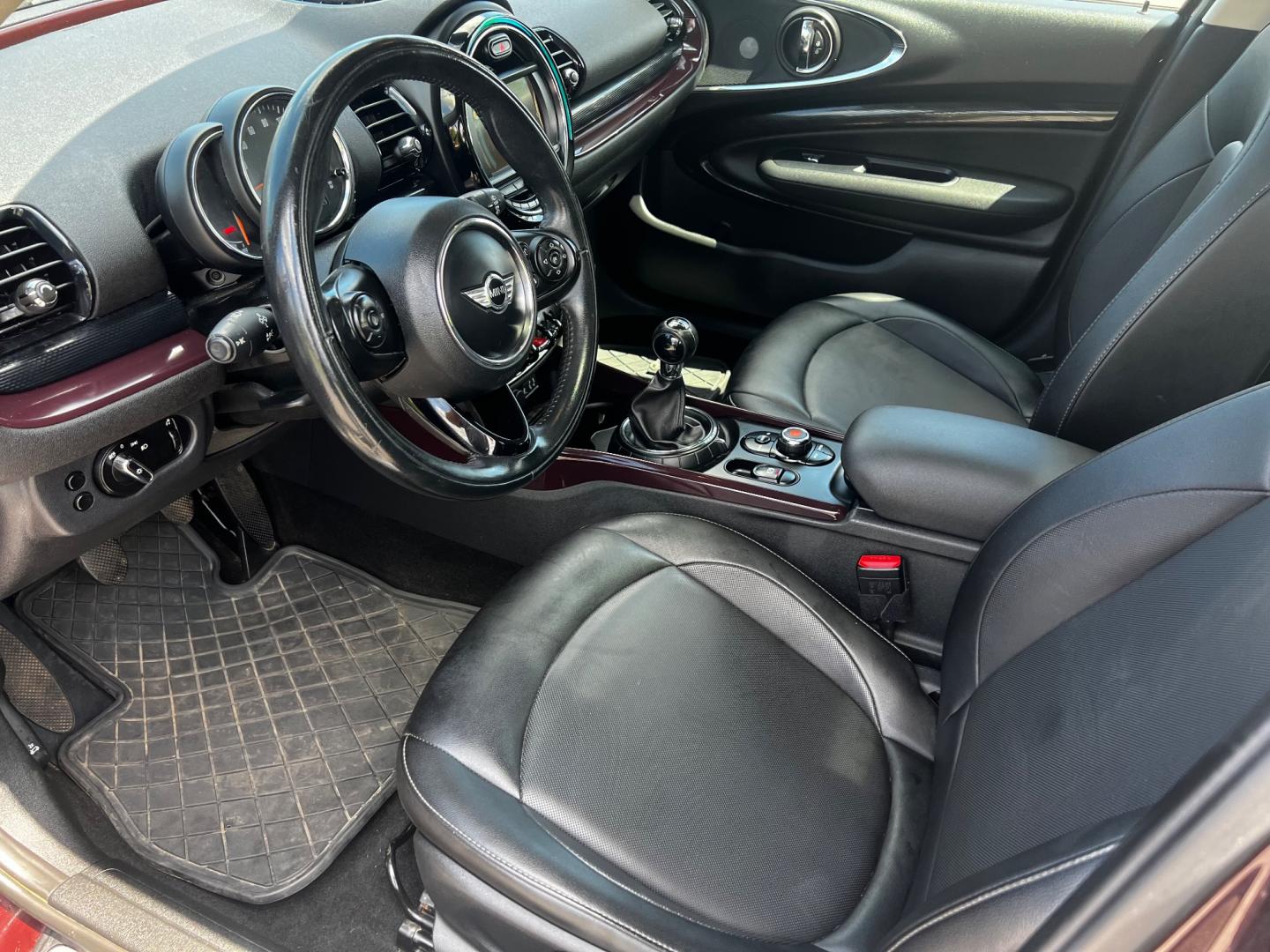 2016 Burgundy /Black Mini Clubman Base (WMWLN5C56G2) with an 1.5L I3 DOHC 16V TURBO engine, 6 Speed Manual transmission, located at 11115 Chardon Rd. , Chardon, OH, 44024, (440) 214-9705, 41.580246, -81.241943 - This 2016 Mini Clubman features a peppy 1.5L I3 turbocharged engine with 136 HP, paired with a 6-speed manual transmission to deliver a spirited driving experience. This stylish vehicle is equipped with practical amenities such as daytime running lights, dusk-sensing headlights, auto-dimming rearvie - Photo#16