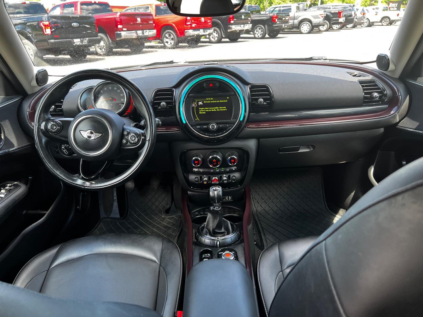 2016 Burgundy /Black Mini Clubman Base (WMWLN5C56G2) with an 1.5L I3 DOHC 16V TURBO engine, 6 Speed Manual transmission, located at 11115 Chardon Rd. , Chardon, OH, 44024, (440) 214-9705, 41.580246, -81.241943 - This 2016 Mini Clubman features a peppy 1.5L I3 turbocharged engine with 136 HP, paired with a 6-speed manual transmission to deliver a spirited driving experience. This stylish vehicle is equipped with practical amenities such as daytime running lights, dusk-sensing headlights, auto-dimming rearvie - Photo#37