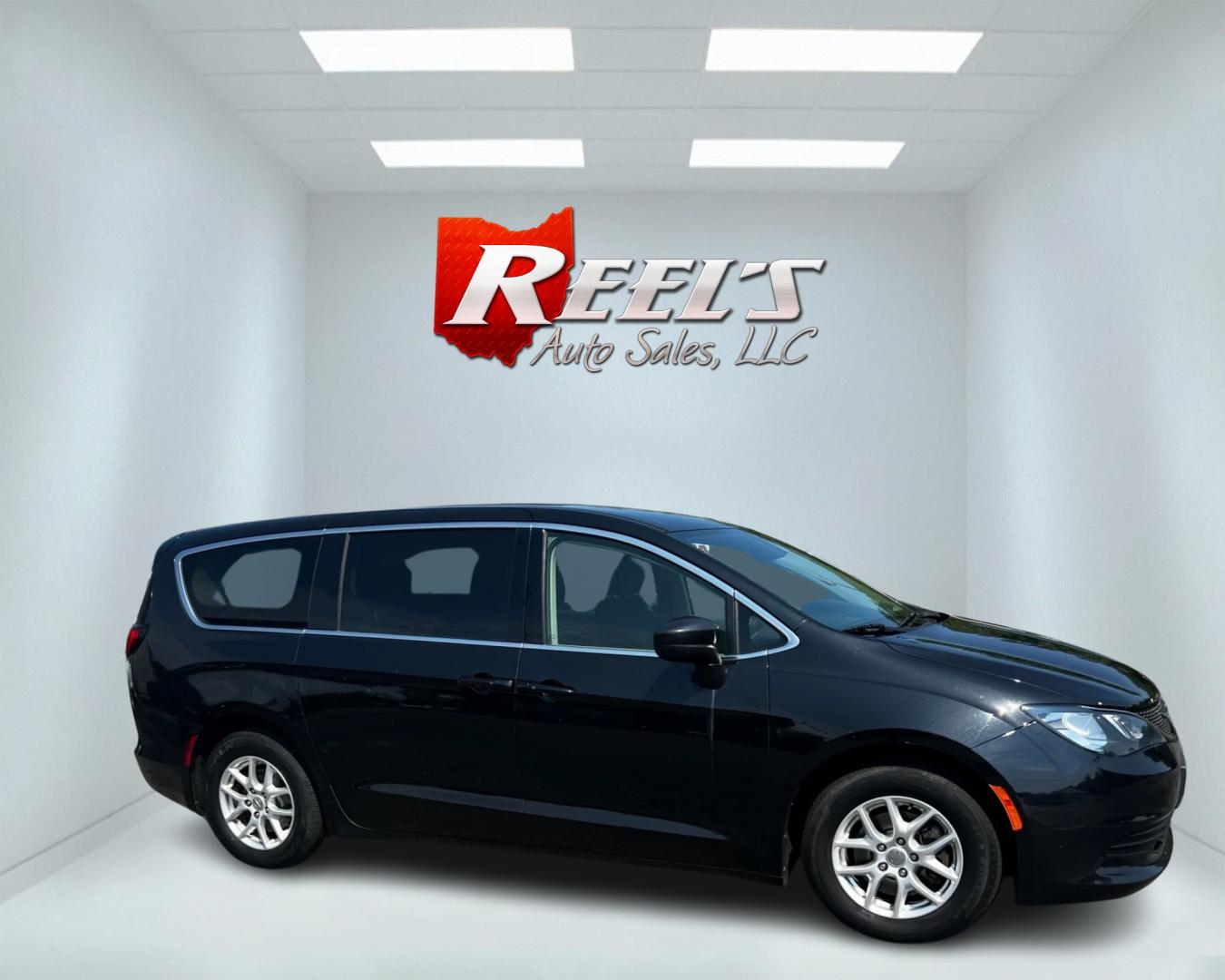 2017 Black /Black Chrysler Pacifica Touring (2C4RC1DG8HR) with an 3.6L V6 DOHC 24V engine, 9A transmission, located at 11115 Chardon Rd. , Chardon, OH, 44024, (440) 214-9705, 41.580246, -81.241943 - This 2017 Chrysler Pacifica Touring is a well-appointed minivan featuring a 3.6L Pentastar V6 engine and a 9-speed automatic transmission, providing robust performance and smooth shifting. The vehicle is equipped with essential safety features such as blind spot monitoring, rear cross-traffic alert, - Photo#3