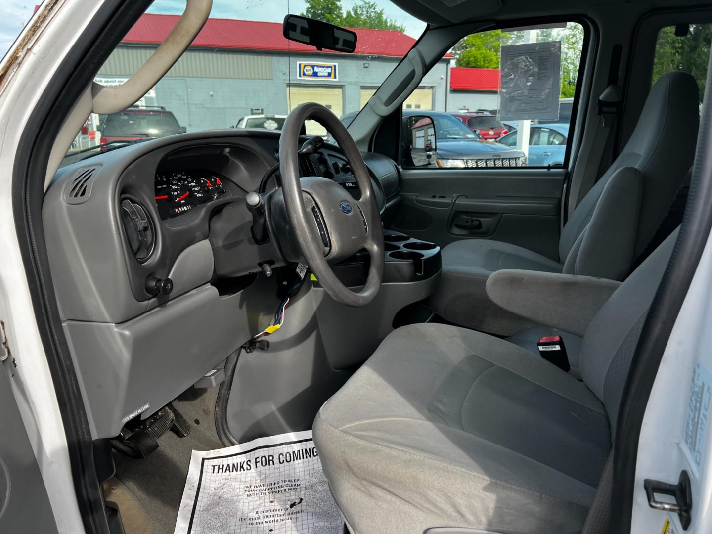 2007 White /Gray Ford E-Series Wagon E-350 XL Super Duty (1FBNE31L07D) with an 5.4L V8 SOHC 16V engine, 4 Speed Auto transmission, located at 547 E. Main St., Orwell, OH, 44076, (440) 437-5893, 41.535435, -80.847855 - This 2007 Ford E-350 XLT Wagon is a versatile and powerful full-size van designed for both passenger transport and heavy-duty applications. Equipped with a robust 5.4-liter Triton V8 engine and a 4-speed automatic transmission, this vehicle offers substantial performance capabilities. It can accommo - Photo#15