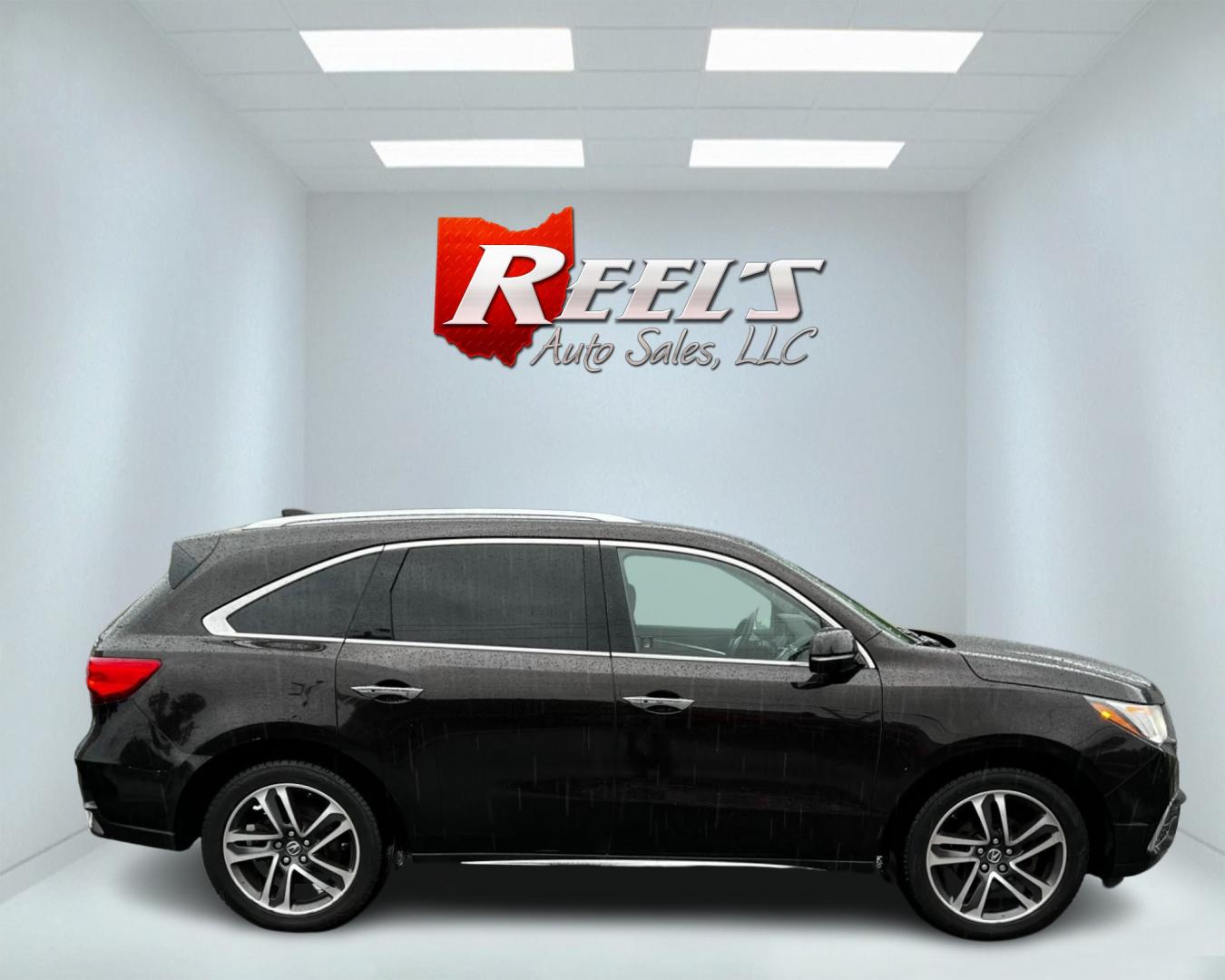 2017 Black /Brown Acura MDX SH-AWD w/Advance and Entertainment (5FRYD4H91HB) with an 3.5L V6 SOHC 24V engine, 9-Speed Automatic transmission, located at 11115 Chardon Rd. , Chardon, OH, 44024, (440) 214-9705, 41.580246, -81.241943 - This 2017 Acura MDX AWD Advance with Entertainment package is a luxurious and well-equipped midsize SUV. It's powered by a 3.5-liter Earth Dreams V6 engine paired with a 9-speed automatic transmission, offering smooth performance and efficiency. The all-wheel-drive system and selectable drive modes - Photo#4