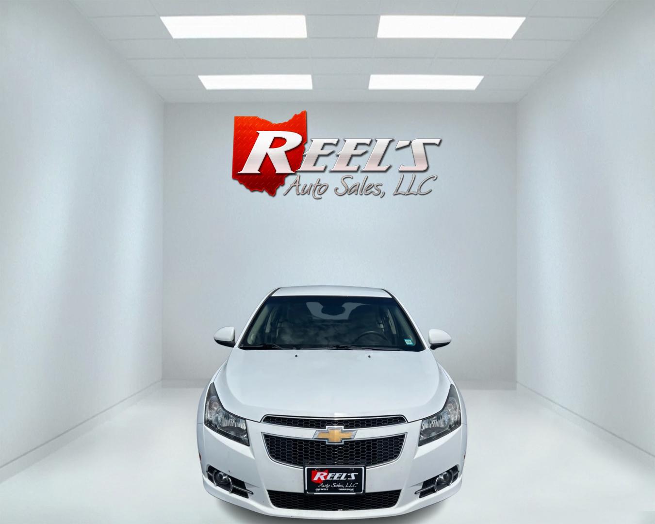 2012 White /Tan Chevrolet Cruze 2LT (1G1PG5SC3C7) with an 1.4L I4 DOHC 16V TURBO engine, 6-Speed Automatic transmission, located at 547 E. Main St., Orwell, OH, 44076, (440) 437-5893, 41.535435, -80.847855 - This 2012 Chevrolet Cruze 2LT is a well-equipped compact sedan that balances performance, comfort, and efficiency. It's powered by a 1.4-liter turbocharged ECOTEC engine paired with a 6-speed automatic transmission, delivering a responsive driving experience while achieving an impressive 36 MPG on t - Photo#1