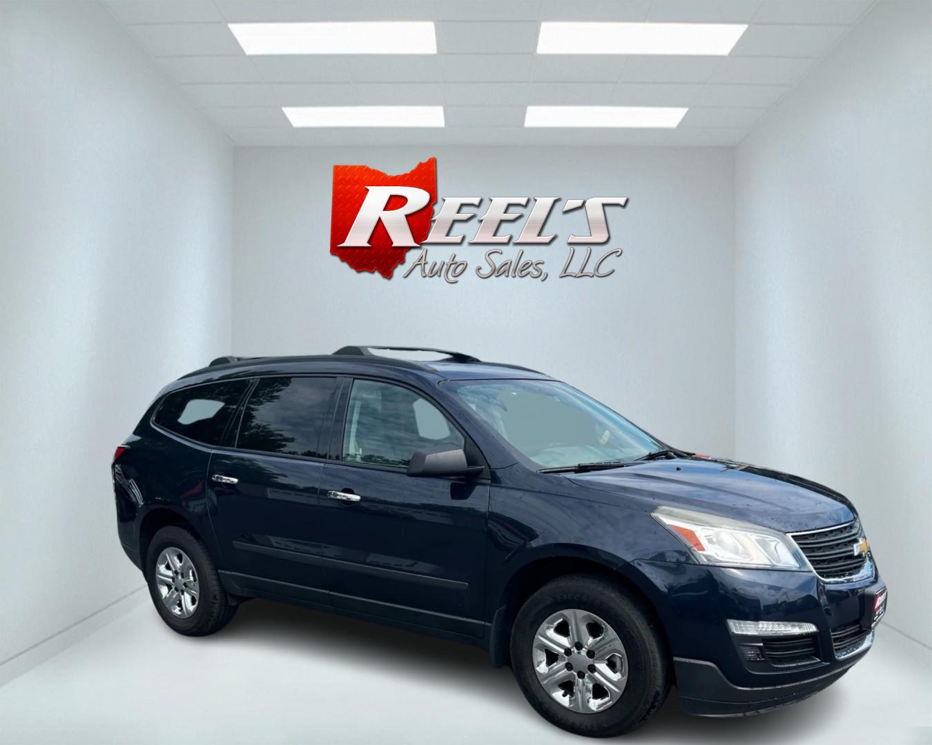 2016 Blue /Gray Chevrolet Traverse LS AWD (1GNKVFKD1GJ) with an 3.6L V6 DOHC 24V engine, 6A transmission, located at 547 E. Main St., Orwell, OH, 44076, (440) 437-5893, 41.535435, -80.847855 - This 2016 Chevrolet Traverse LS AWD is a spacious and capable midsize SUV. It's powered by a robust 3.6-liter V6 engine coupled with a 6-speed automatic transmission, providing ample power for everyday driving and family hauling. The all-wheel-drive system enhances traction and stability in various - Photo#3