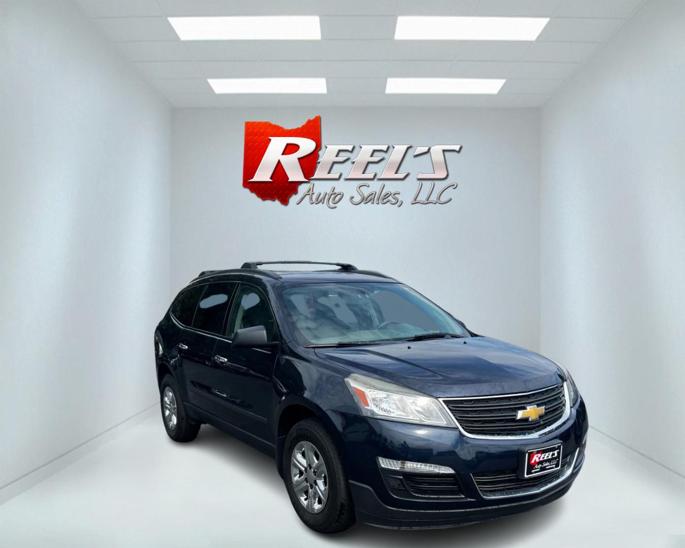 2016 Blue /Gray Chevrolet Traverse LS AWD (1GNKVFKD1GJ) with an 3.6L V6 DOHC 24V engine, 6A transmission, located at 547 E. Main St., Orwell, OH, 44076, (440) 437-5893, 41.535435, -80.847855 - This 2016 Chevrolet Traverse LS AWD is a spacious and capable midsize SUV. It's powered by a robust 3.6-liter V6 engine coupled with a 6-speed automatic transmission, providing ample power for everyday driving and family hauling. The all-wheel-drive system enhances traction and stability in various - Photo#2