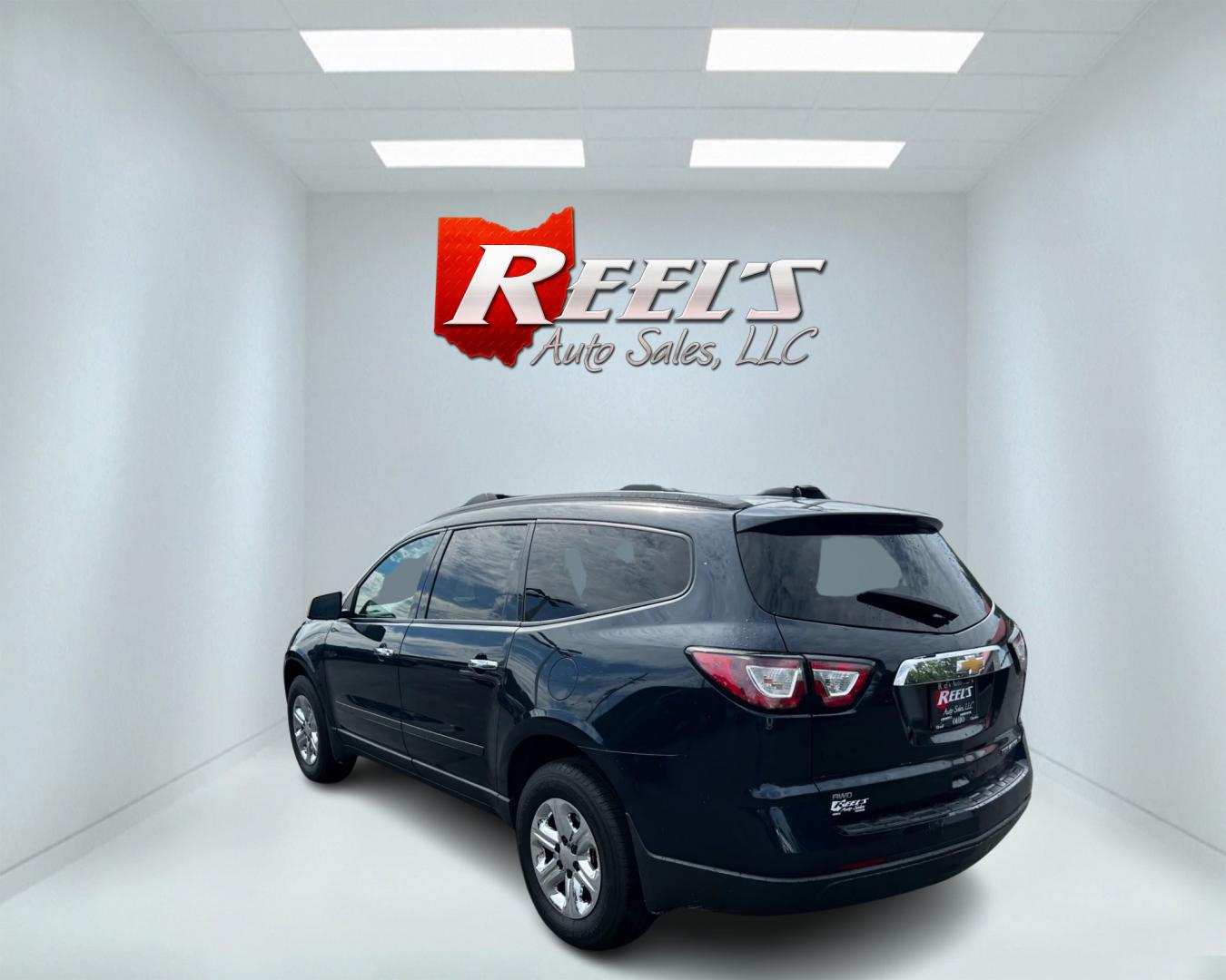 2016 Blue /Gray Chevrolet Traverse LS AWD (1GNKVFKD1GJ) with an 3.6L V6 DOHC 24V engine, 6A transmission, located at 547 E. Main St., Orwell, OH, 44076, (440) 437-5893, 41.535435, -80.847855 - This 2016 Chevrolet Traverse LS AWD is a spacious and capable midsize SUV. It's powered by a robust 3.6-liter V6 engine coupled with a 6-speed automatic transmission, providing ample power for everyday driving and family hauling. The all-wheel-drive system enhances traction and stability in various - Photo#7