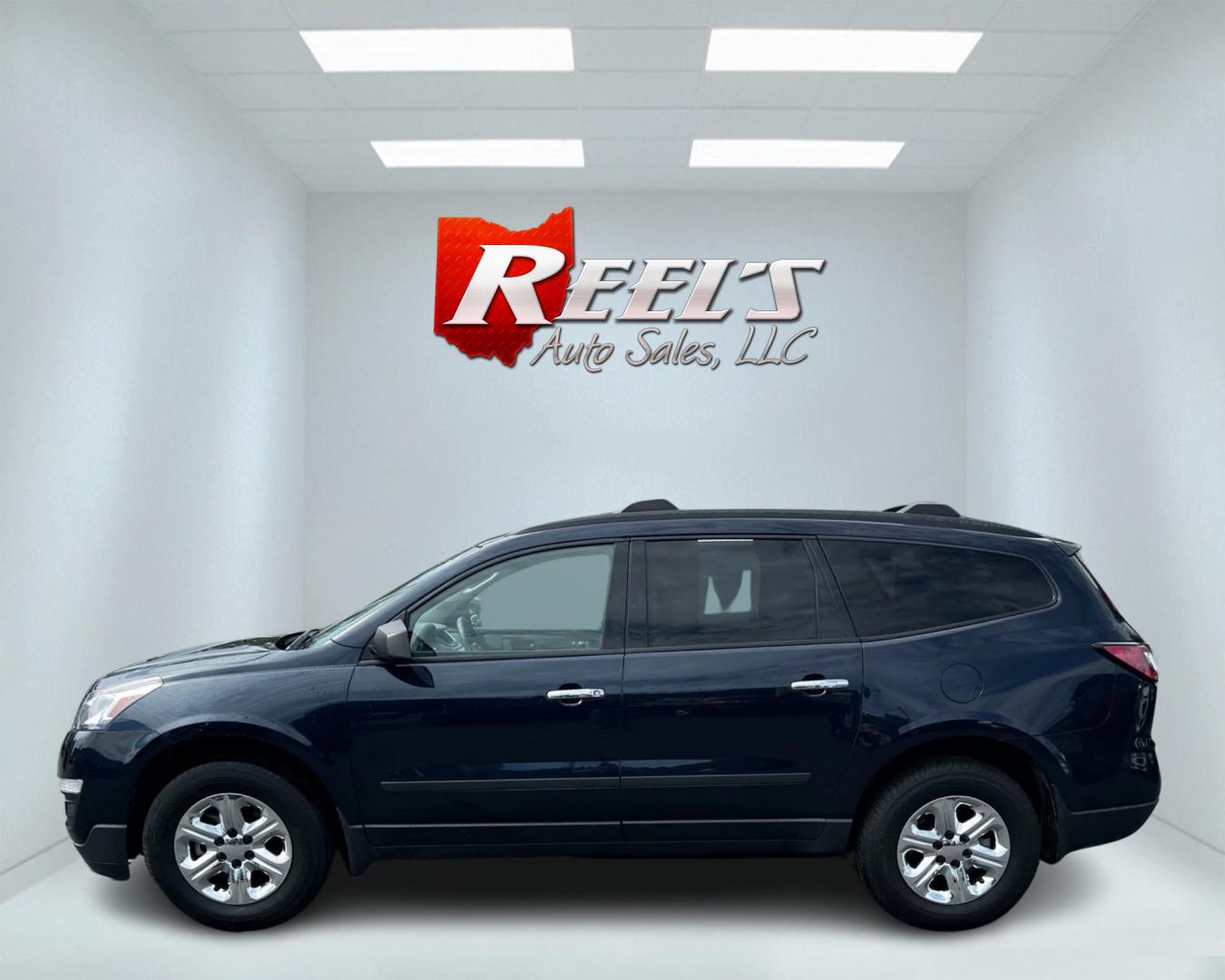 2016 Blue /Gray Chevrolet Traverse LS AWD (1GNKVFKD1GJ) with an 3.6L V6 DOHC 24V engine, 6A transmission, located at 547 E. Main St., Orwell, OH, 44076, (440) 437-5893, 41.535435, -80.847855 - This 2016 Chevrolet Traverse LS AWD is a spacious and capable midsize SUV. It's powered by a robust 3.6-liter V6 engine coupled with a 6-speed automatic transmission, providing ample power for everyday driving and family hauling. The all-wheel-drive system enhances traction and stability in various - Photo#8