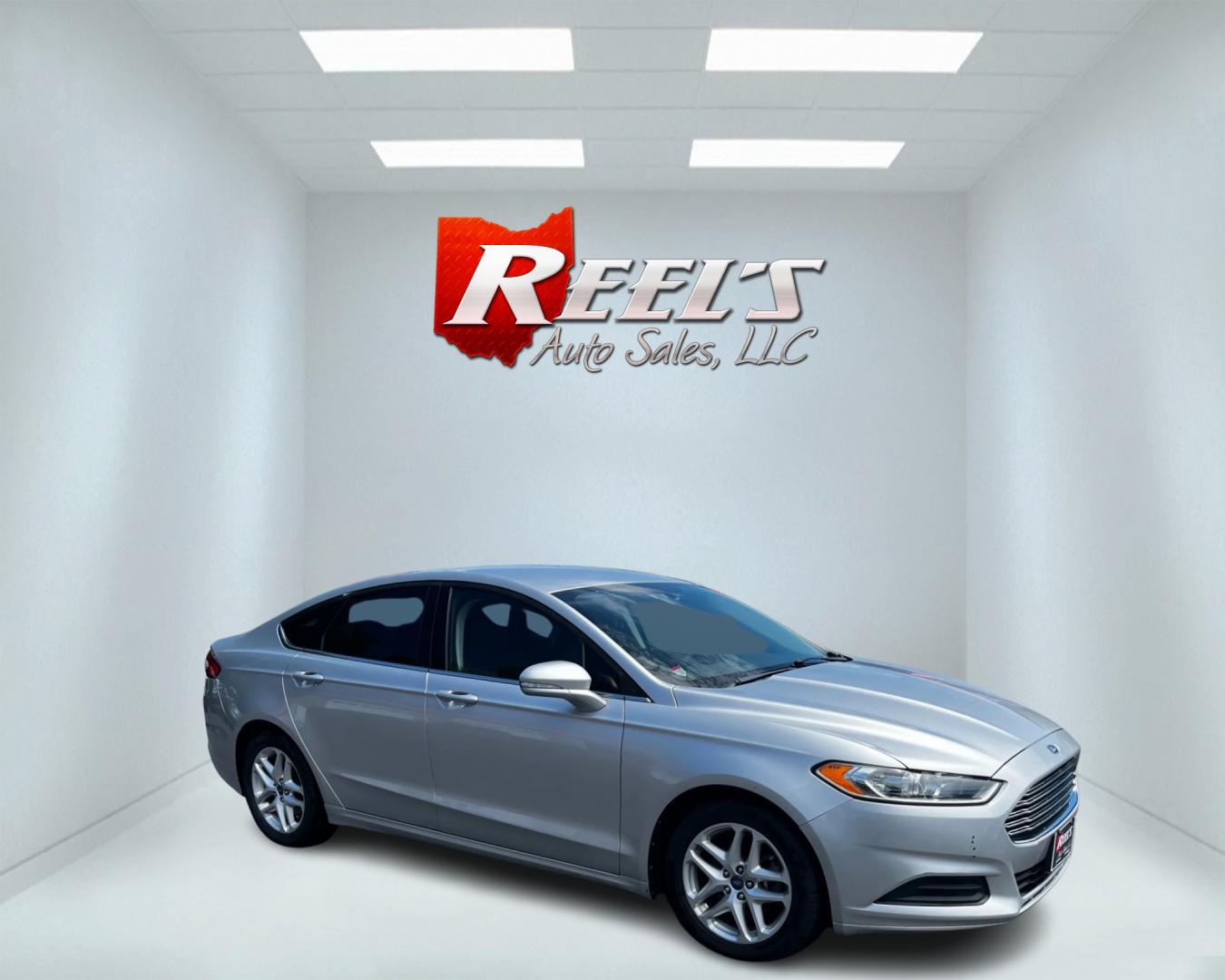 2013 Silver /Black Ford Fusion SE (3FA6P0H70DR) with an 2.5L I4 DOHC 16V engine, 6-Speed Automatic transmission, located at 547 E. Main St., Orwell, OH, 44076, (440) 437-5893, 41.535435, -80.847855 - Photo#3