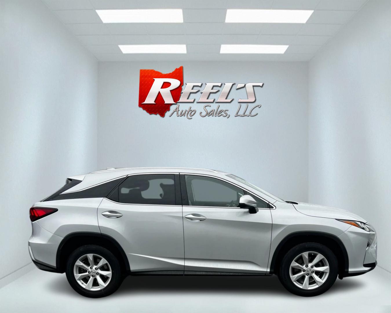 2017 Silver /Black Lexus RX 350 AWD (2T2BZMCA5HC) with an 3.5L V6 DOHC 24V engine, 8-Speed Automatic transmission, located at 11115 Chardon Rd. , Chardon, OH, 44024, (440) 214-9705, 41.580246, -81.241943 - This 2017 Lexus RX350 AWD is a luxurious midsize SUV that combines performance, comfort, and advanced technology. It's powered by a potent 295-horsepower 3.5-liter V6 engine paired with an 8-speed automatic transmission, providing smooth and responsive performance. The all-wheel-drive system and sel - Photo#4