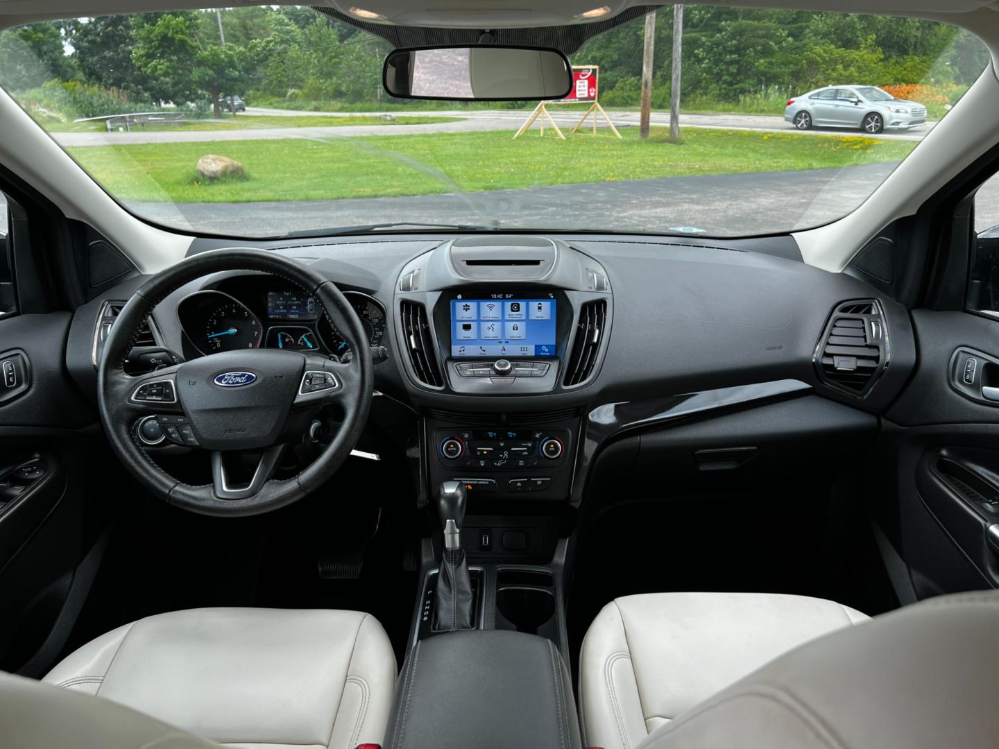 2018 Black /White Ford Escape SEL 4WD (1FMCU9HD1JU) with an 1.5L I4 DOHC 16V TURBO engine, 6A transmission, located at 547 E. Main St., Orwell, OH, 44076, (440) 437-5893, 41.535435, -80.847855 - This 2018 Ford Escape SEL 4WD is a well-equipped compact SUV that offers a blend of performance, comfort, and technology. It features a 1.5-liter EcoBoost engine paired with a 6-speed automatic transmission, providing efficient power delivery to all four wheels. The interior boasts leather seating w - Photo#38