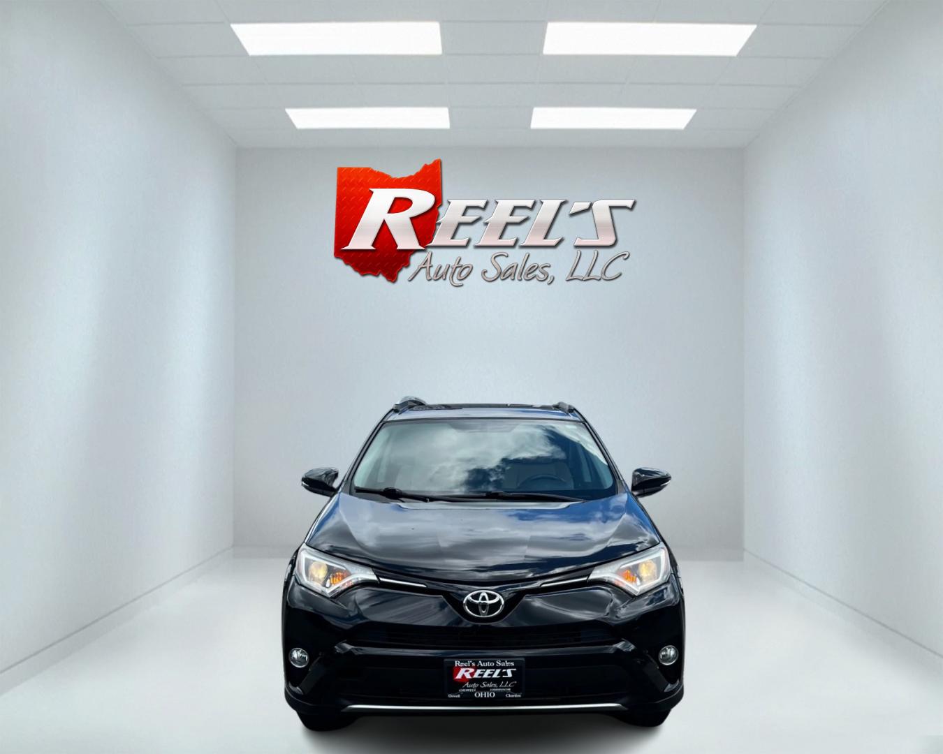 2016 Black /Tan Toyota RAV4 XLE AWD (2T3RFREV5GW) with an 2.5L I4 DOHC 16V engine, 6-Speed Automatic transmission, located at 547 E. Main St., Orwell, OH, 44076, (440) 437-5893, 41.535435, -80.847855 - This 2016 Toyota RAV4 XLE AWD is a practical and well-equipped compact SUV. It features a 2.5-liter 4-cylinder engine paired with a 6-speed automatic transmission, providing reliable performance with all-wheel drive capability. The XLE trim offers a good balance of comfort and features, including du - Photo#1