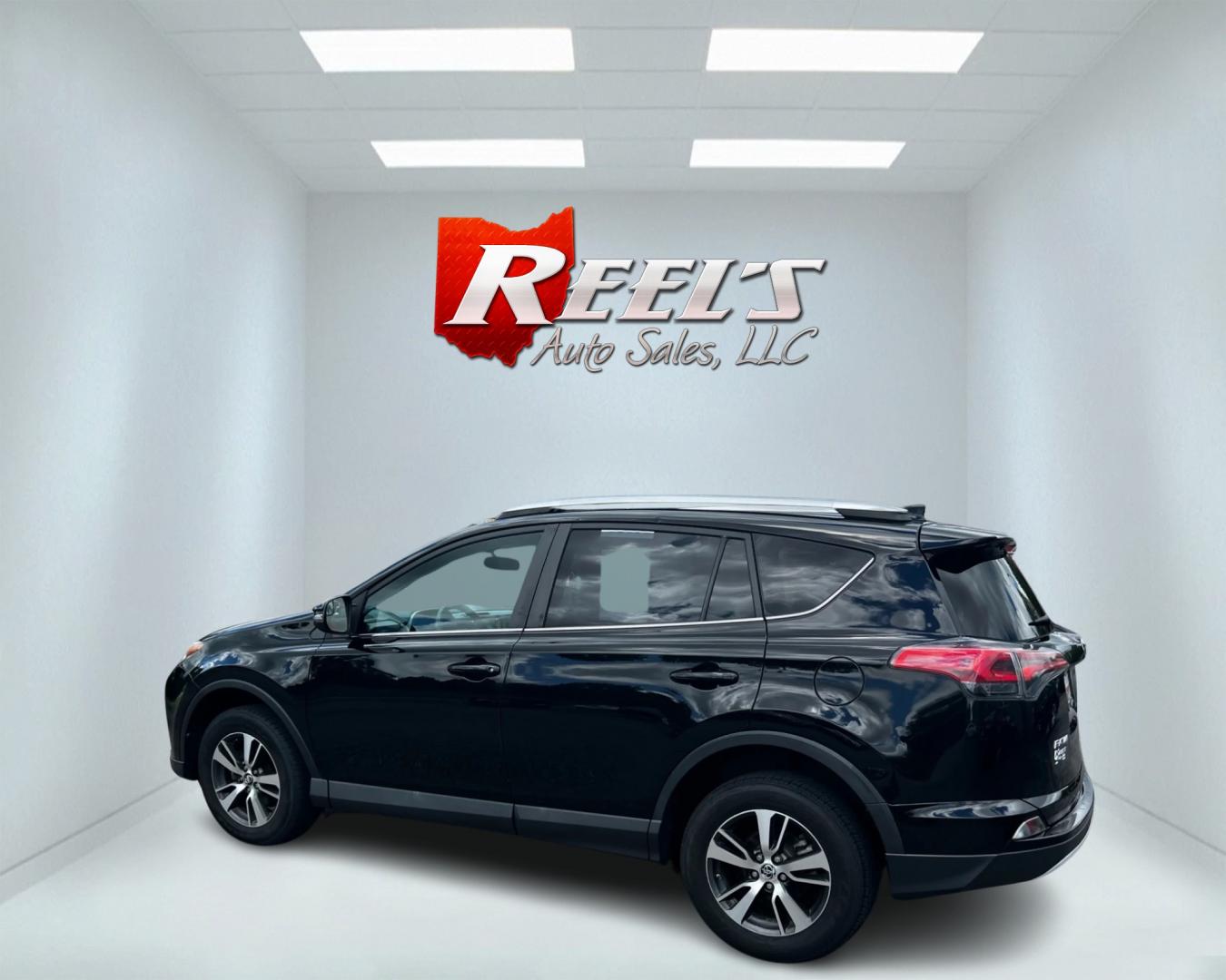 2016 Black /Tan Toyota RAV4 XLE AWD (2T3RFREV5GW) with an 2.5L I4 DOHC 16V engine, 6-Speed Automatic transmission, located at 547 E. Main St., Orwell, OH, 44076, (440) 437-5893, 41.535435, -80.847855 - This 2016 Toyota RAV4 XLE AWD is a practical and well-equipped compact SUV. It features a 2.5-liter 4-cylinder engine paired with a 6-speed automatic transmission, providing reliable performance with all-wheel drive capability. The XLE trim offers a good balance of comfort and features, including du - Photo#8