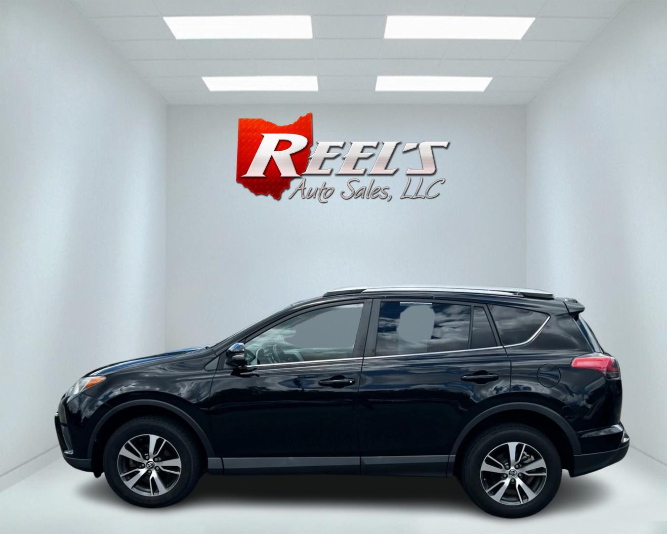 2016 Black /Tan Toyota RAV4 XLE AWD (2T3RFREV5GW) with an 2.5L I4 DOHC 16V engine, 6-Speed Automatic transmission, located at 547 E. Main St., Orwell, OH, 44076, (440) 437-5893, 41.535435, -80.847855 - Photo#9