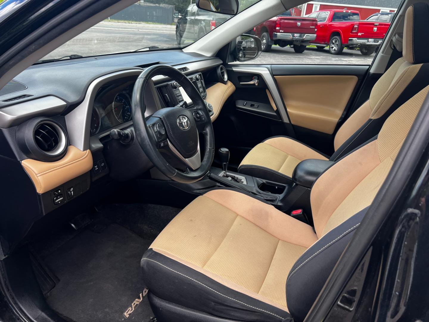 2016 Black /Tan Toyota RAV4 XLE AWD (2T3RFREV5GW) with an 2.5L I4 DOHC 16V engine, 6-Speed Automatic transmission, located at 547 E. Main St., Orwell, OH, 44076, (440) 437-5893, 41.535435, -80.847855 - Photo#17