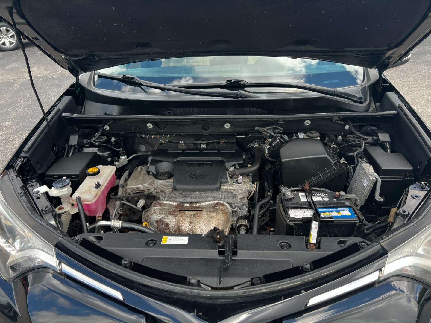 2016 Black /Tan Toyota RAV4 XLE AWD (2T3RFREV5GW) with an 2.5L I4 DOHC 16V engine, 6-Speed Automatic transmission, located at 547 E. Main St., Orwell, OH, 44076, (440) 437-5893, 41.535435, -80.847855 - Photo#16