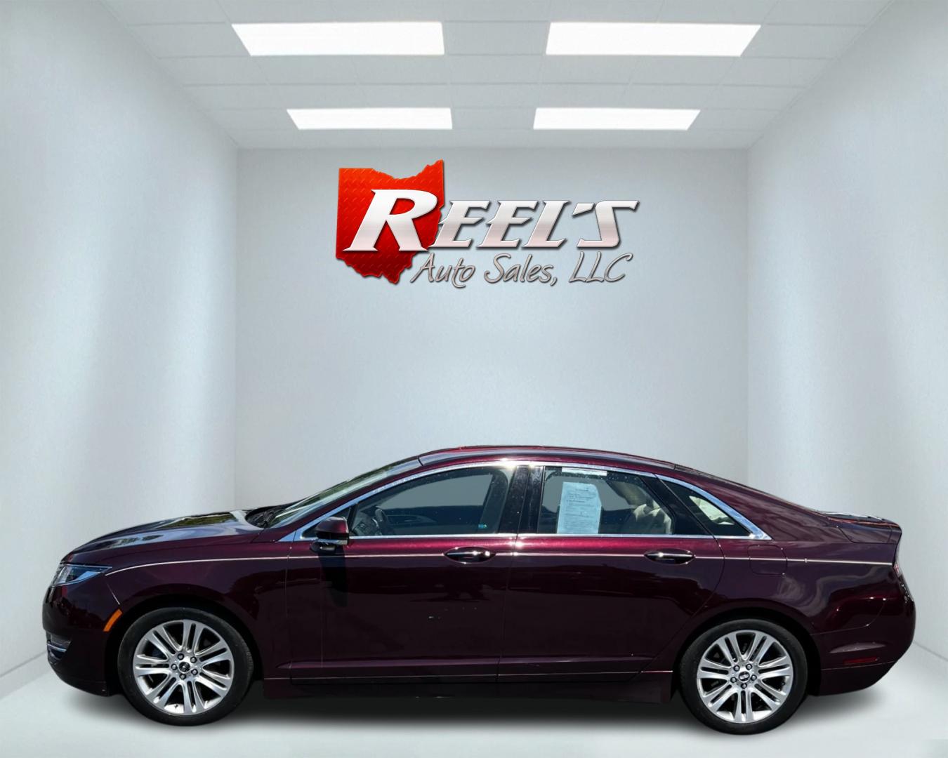 2013 Burgundy /Tan Lincoln MKZ Select AWD (3LN6L2J93DR) with an 2.0L I4 DOHC 16V Turbo engine, 6-Speed Automatic transmission, located at 547 E. Main St., Orwell, OH, 44076, (440) 437-5893, 41.535435, -80.847855 - This 2013 Lincoln MKZ Select AWD is a luxury midsize sedan that offers a blend of performance, comfort, and technology. It's powered by a 2.0-liter EcoBoost engine paired with a 6-speed automatic transmission and all-wheel drive for enhanced handling and traction. The exterior features adaptive LED - Photo#8