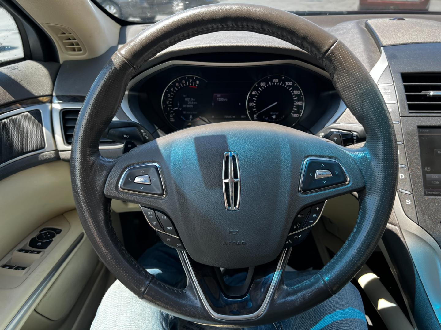 2013 Burgundy /Tan Lincoln MKZ Select AWD (3LN6L2J93DR) with an 2.0L I4 DOHC 16V Turbo engine, 6-Speed Automatic transmission, located at 547 E. Main St., Orwell, OH, 44076, (440) 437-5893, 41.535435, -80.847855 - This 2013 Lincoln MKZ Select AWD is a luxury midsize sedan that offers a blend of performance, comfort, and technology. It's powered by a 2.0-liter EcoBoost engine paired with a 6-speed automatic transmission and all-wheel drive for enhanced handling and traction. The exterior features adaptive LED - Photo#24