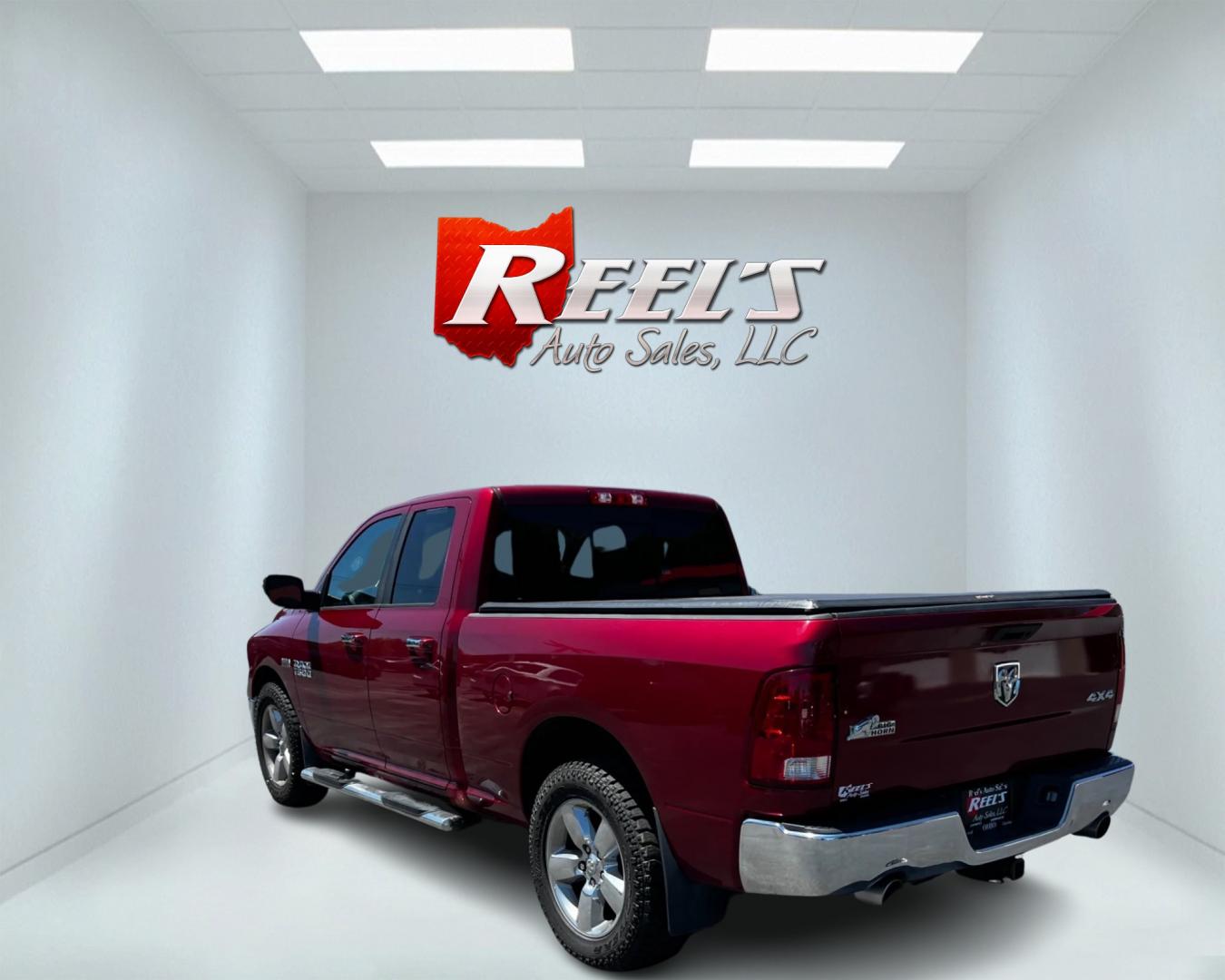 2014 Red /Gray RAM 1500 Big Horn Quad Cab 4WD (1C6RR7GT4ES) with an 5.7L V8 OHV 16V engine, 8-Speed Automatic transmission, located at 547 E. Main St., Orwell, OH, 44076, (440) 437-5893, 41.535435, -80.847855 - This 2014 Ram 1500 Big Horn Quad Cab is a versatile and powerful pickup truck. It features a robust 5.7L HEMI V8 engine producing 395 HP and 410 lb-ft of torque, paired with an efficient 8-speed automatic transmission. The 4WD system, 3.21 gearing, and limited-slip rear differential provide excellen - Photo#7